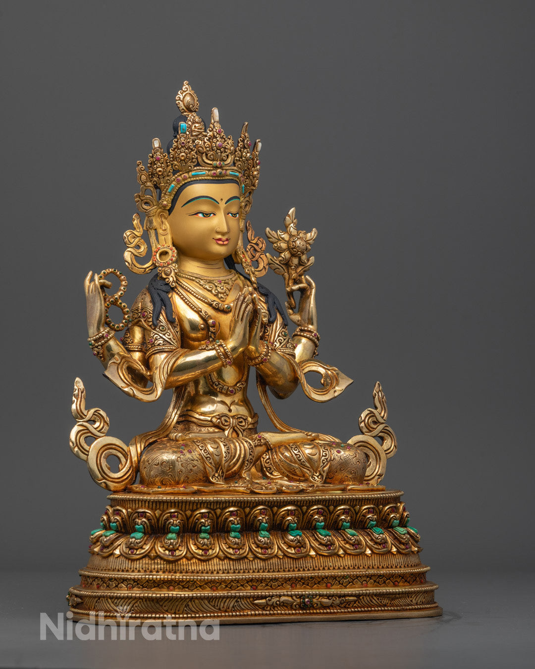 Side angle of Tibetan Avalokiteshvara Mantra Sculpture, gold fire-gilded body with bright finish
