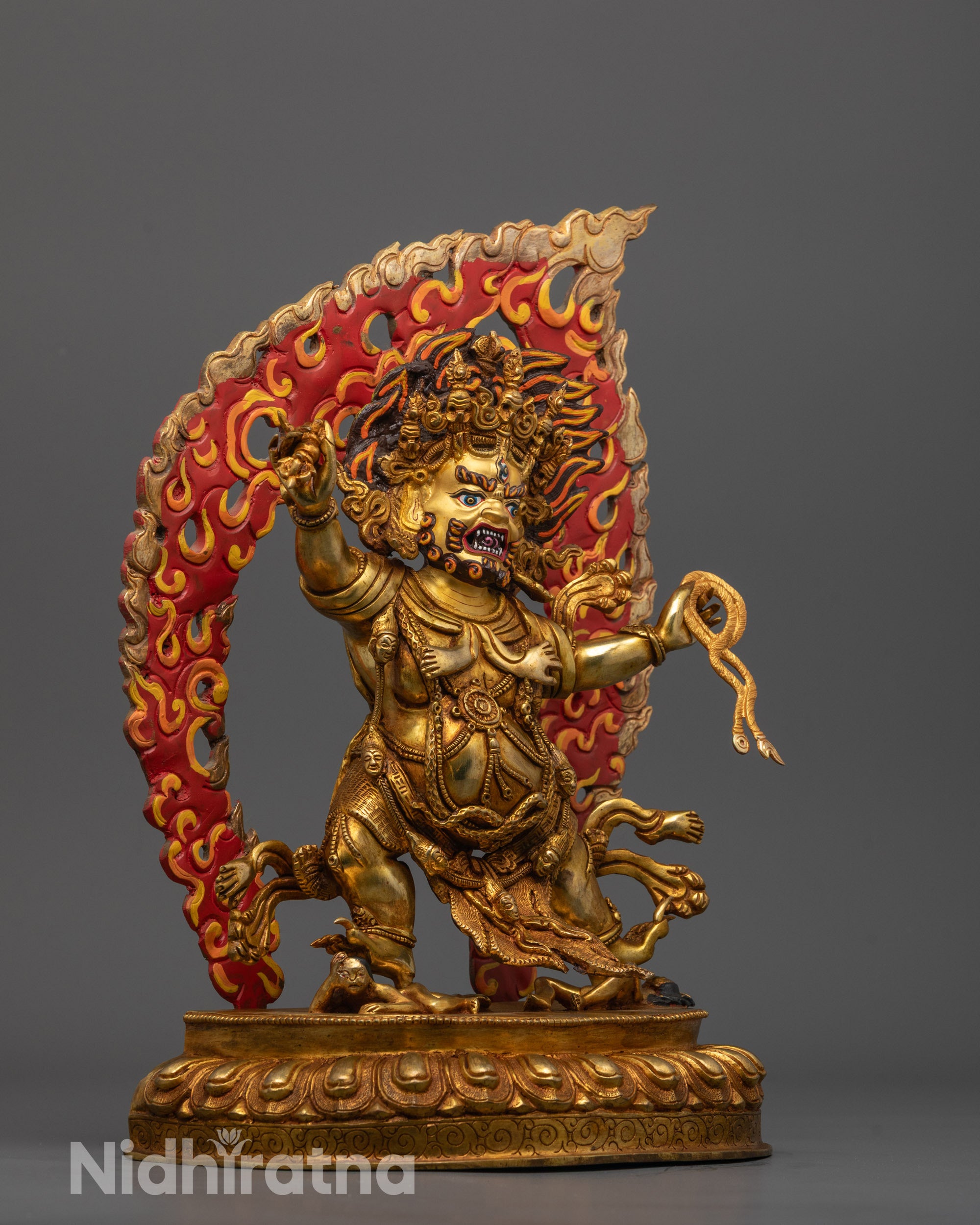 Side angle of Vajrapani Statue showcasing the dynamic posture and fire gilding craftsmanship