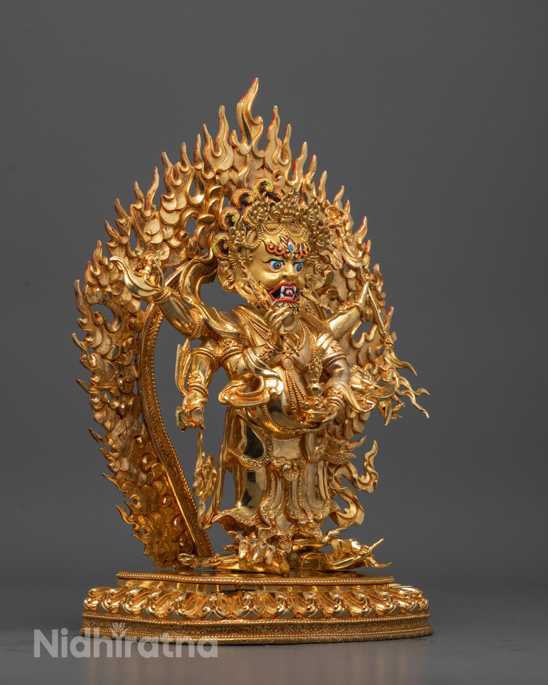 Side angle of White Mahakala Statue showing intricate Himalayan craftsmanship