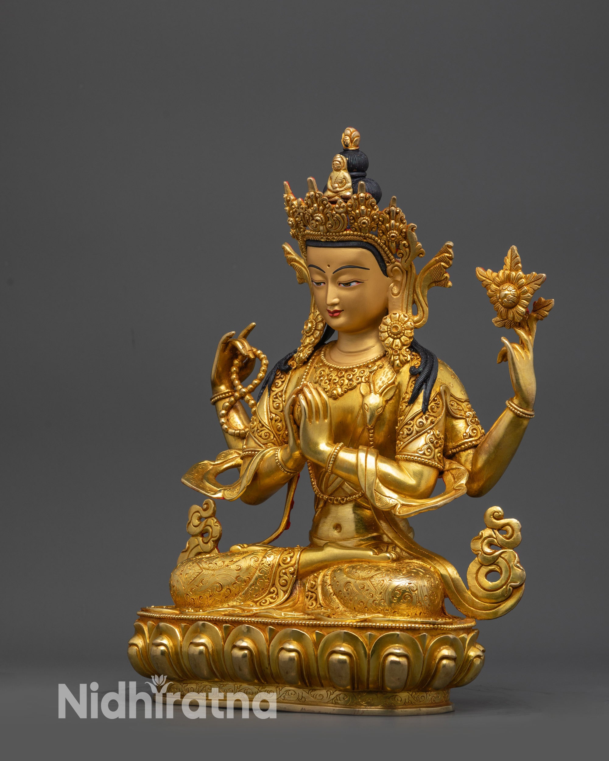 Side angle of gold fire-gilded Chenrezig Buddha of Mercy sculpture