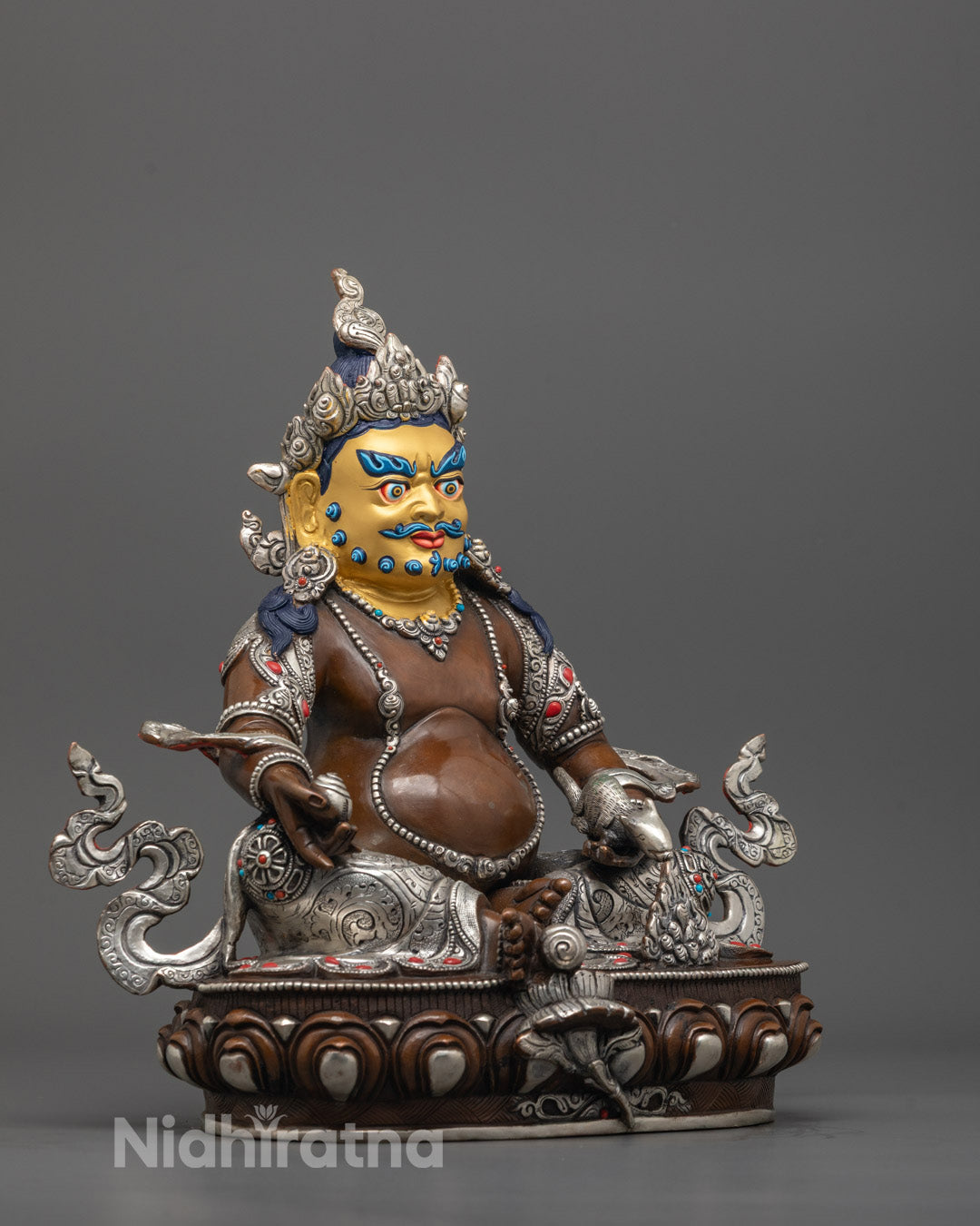 Side angle of handcrafted Dzambhala Statue in royal ease pose, showcasing detailed craftsmanship