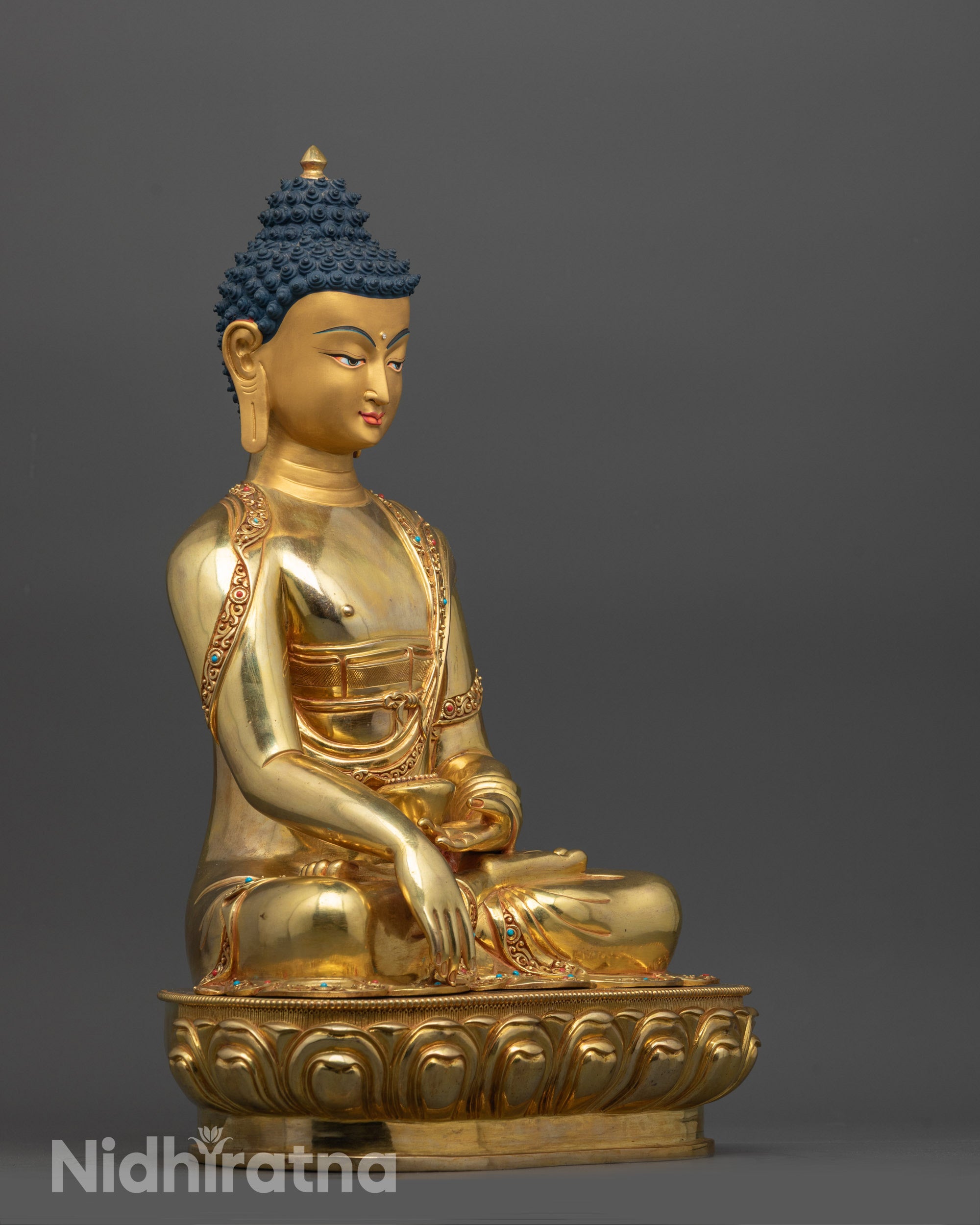 Side angle of handcrafted Shakyamuni Buddha statue showing Patra bowl and Earth-touching mudra