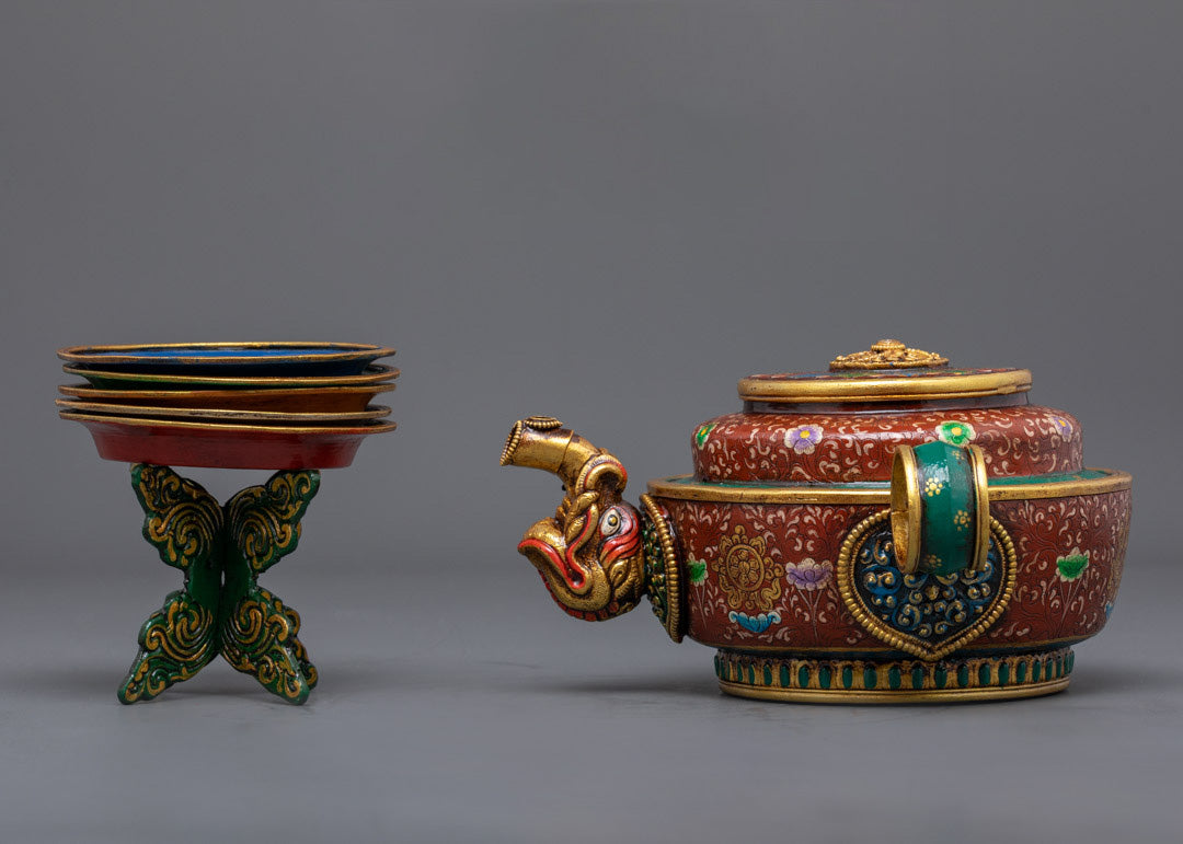 Side angle of sacred offering pot showing artisan carvings and painted patterns
