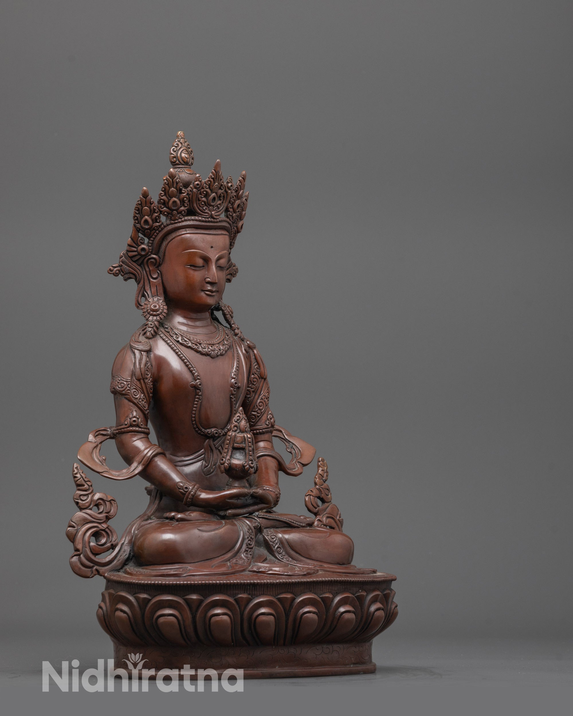 Side angle of the Amitayus Buddha Statue showing intricate lotus seat design