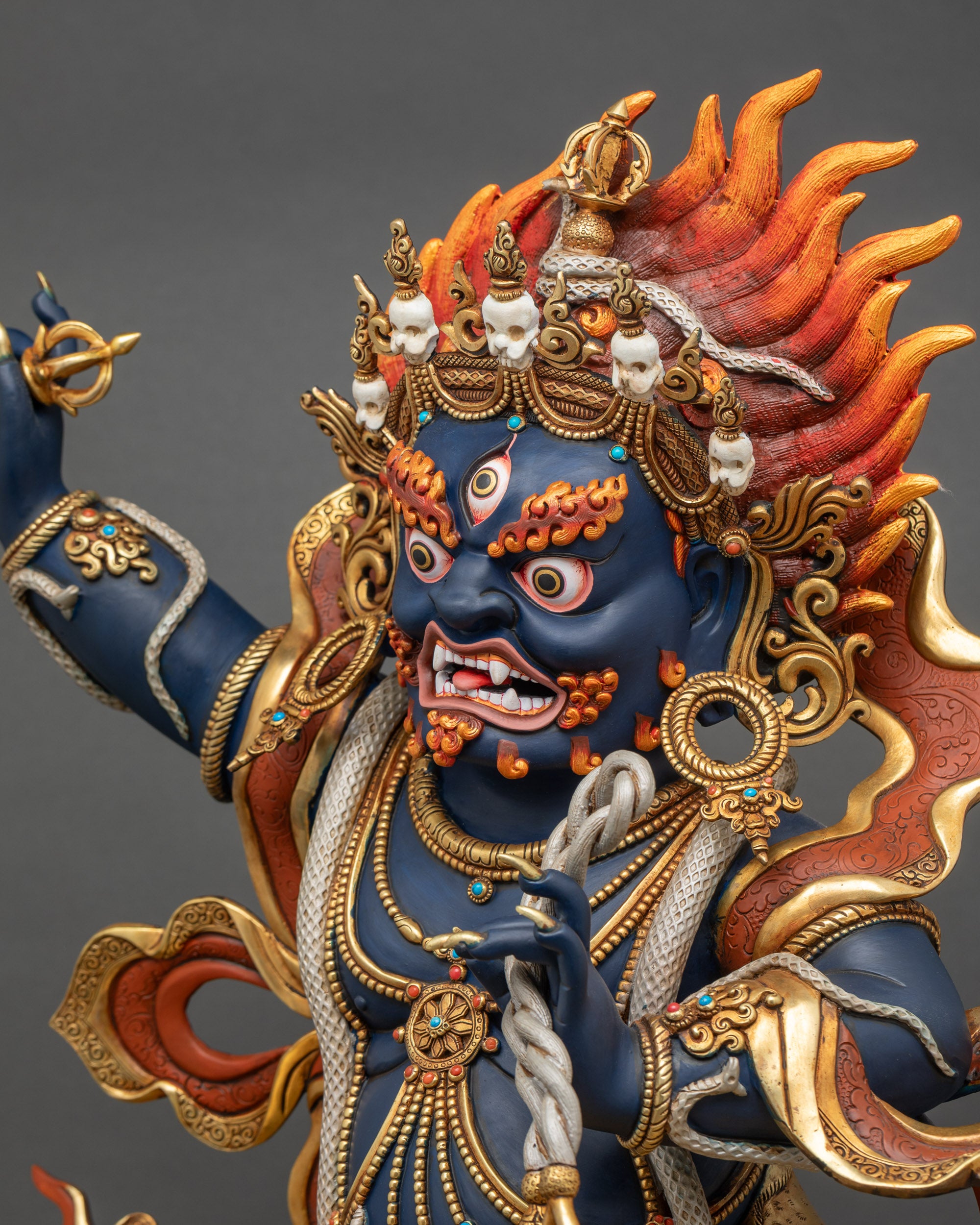 Side close-up highlighting Vajrapani Statue’s flowing robe and flaming halo detail
