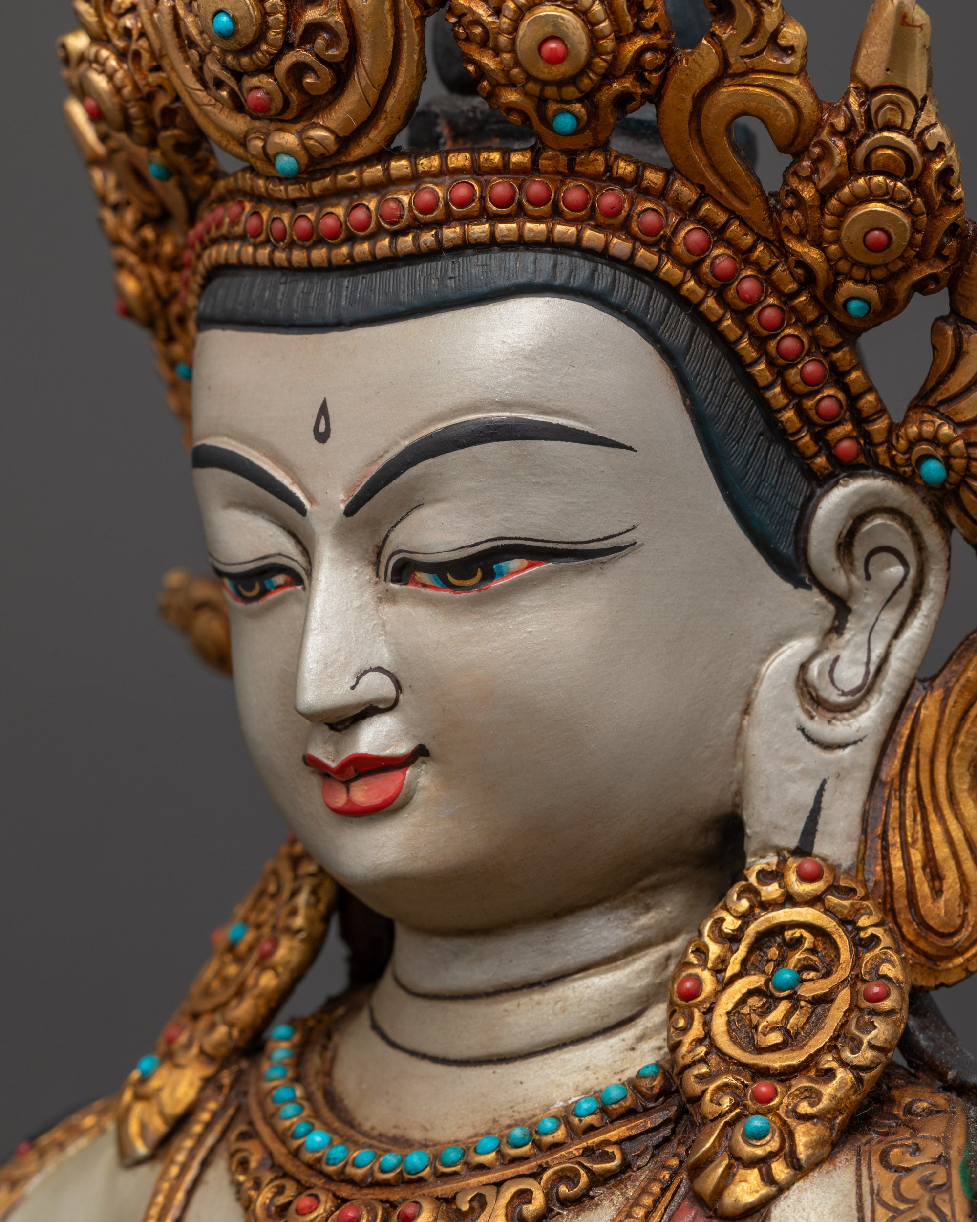 Side close up face of Union Dorje Sempa Yab-Yum with serene expression