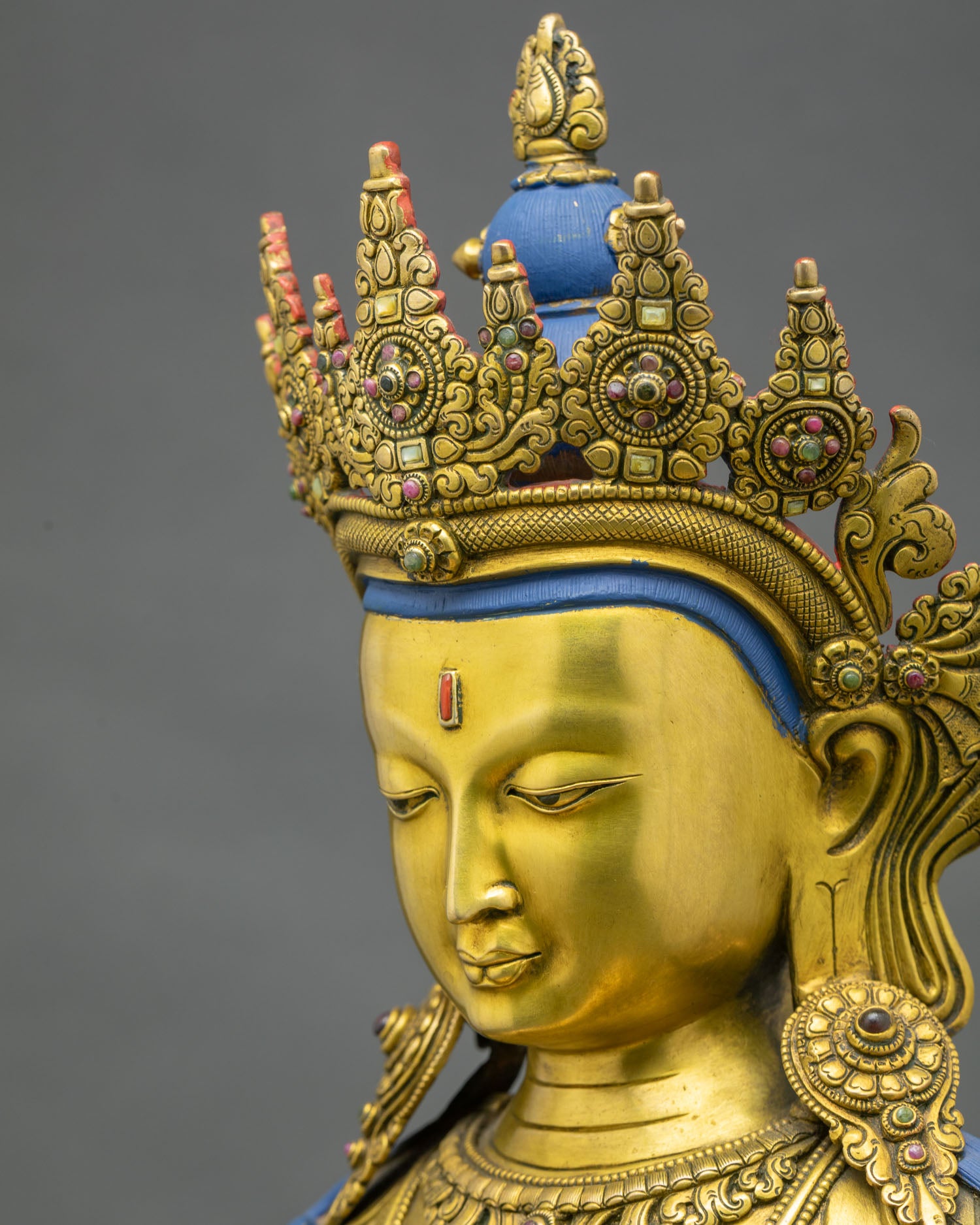 side-close-up-of-amitayus-statue-highlighting-intricate-jewelry-lotus-seat-and-gilded-copper-body