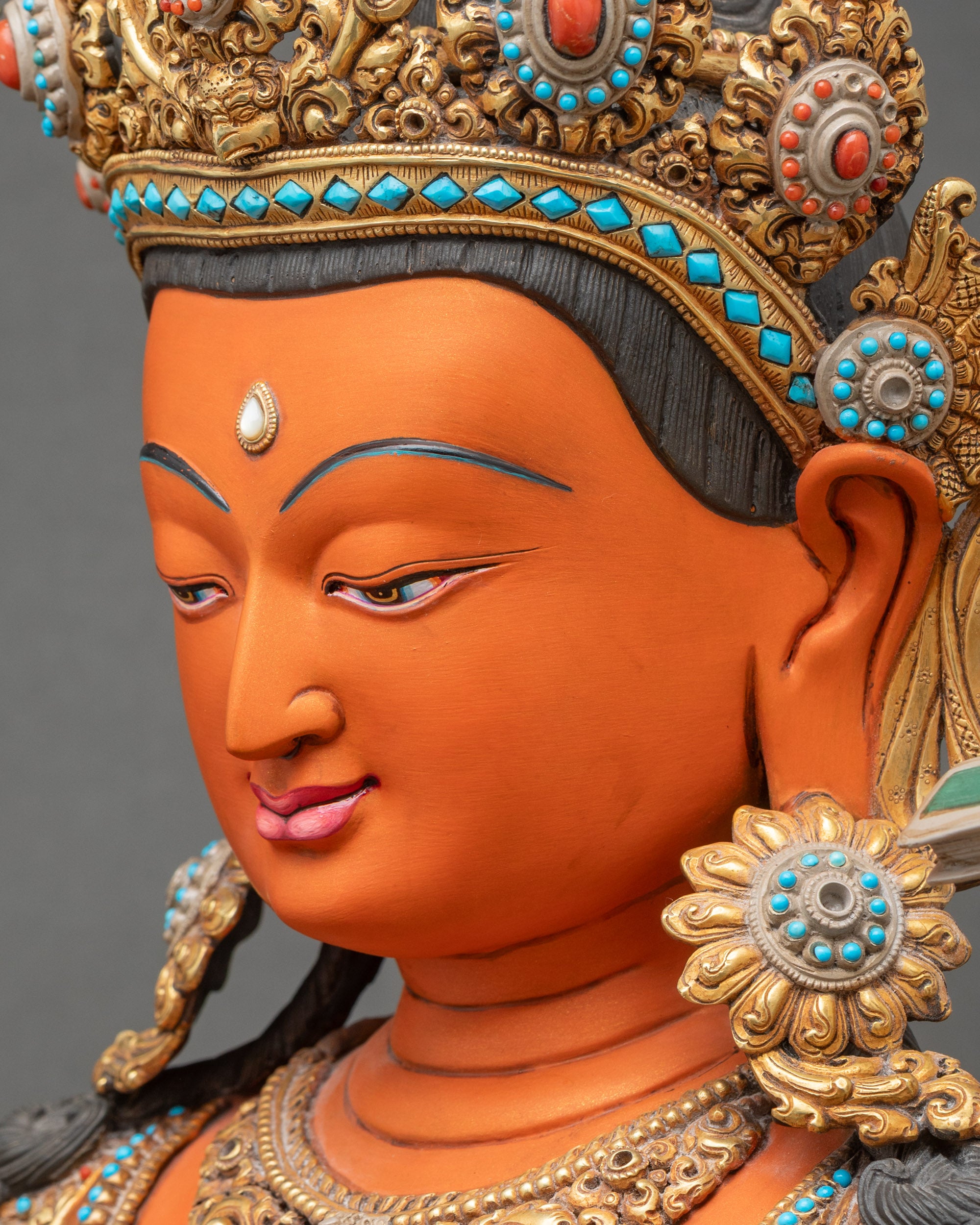 Side face detail of Manjushri Bodhisattva Statue – Peaceful expression Tibetan Buddhist Art