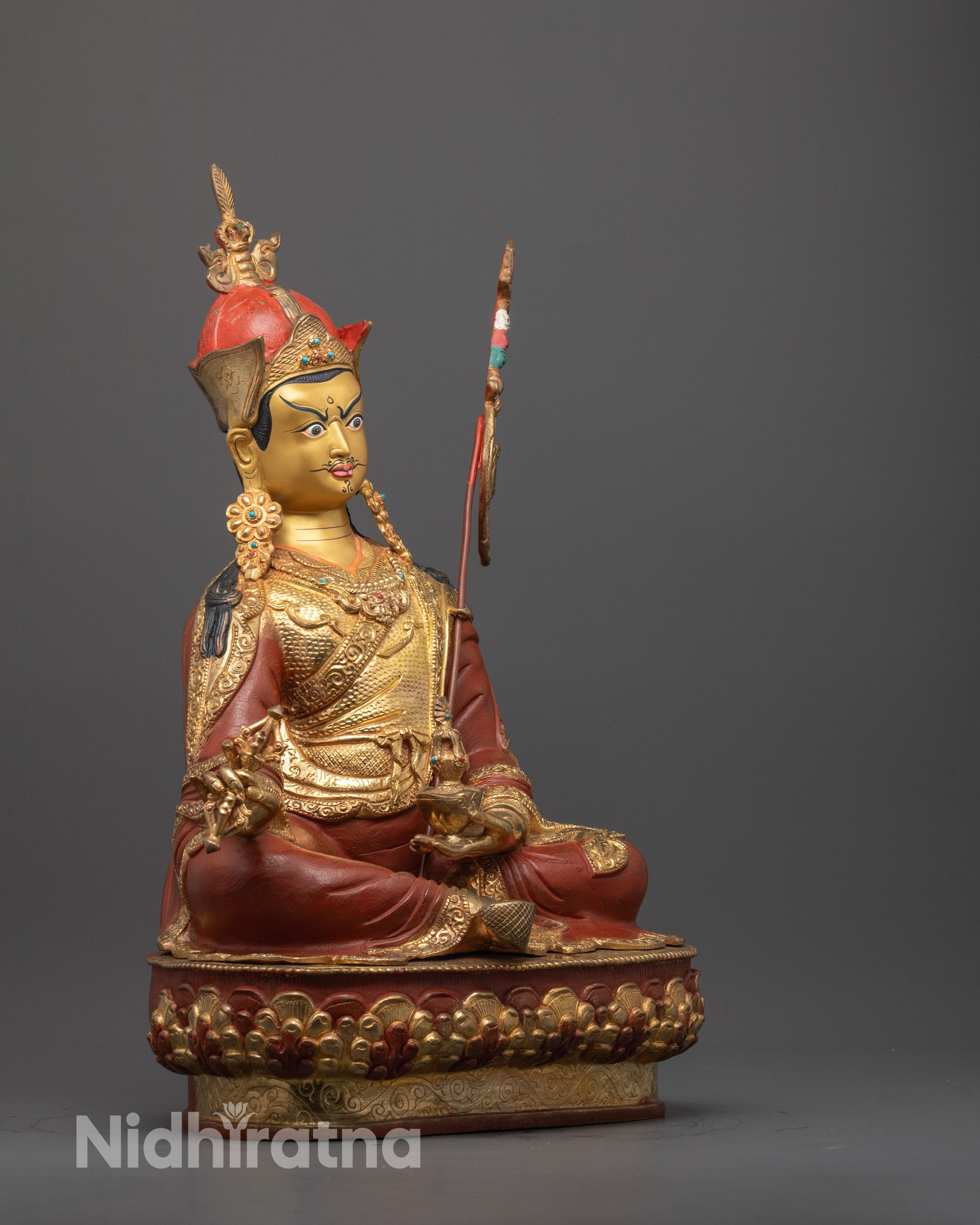 Side profile of Nepalese Guru Rinpoche Statue highlighting copper structure