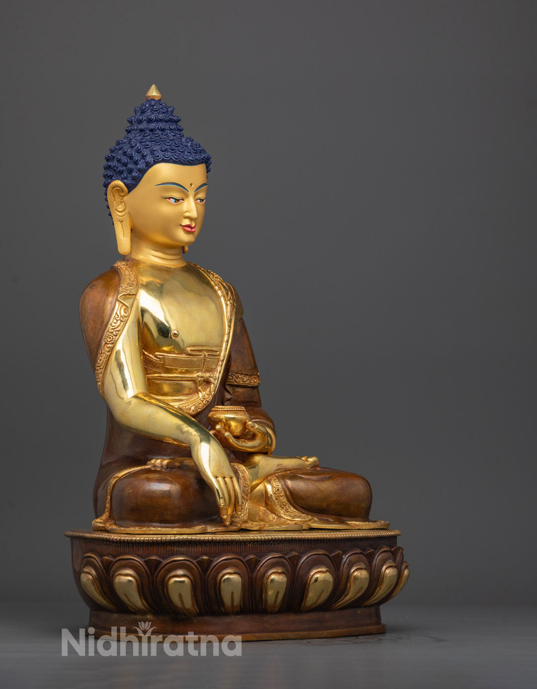 Side profile of intricate Bhumisparsha Mudra Shakyamuni Buddha Tibetan statue