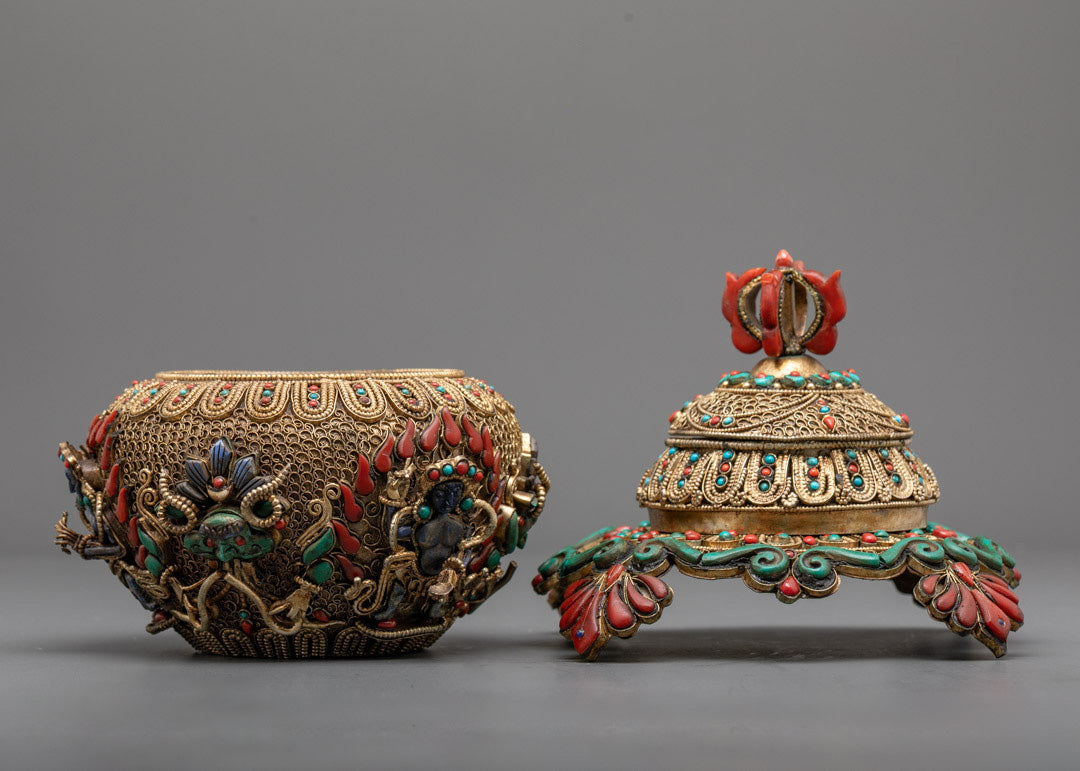 Side profile of ritual rice bowl highlighting curved copper body and detailed carvings