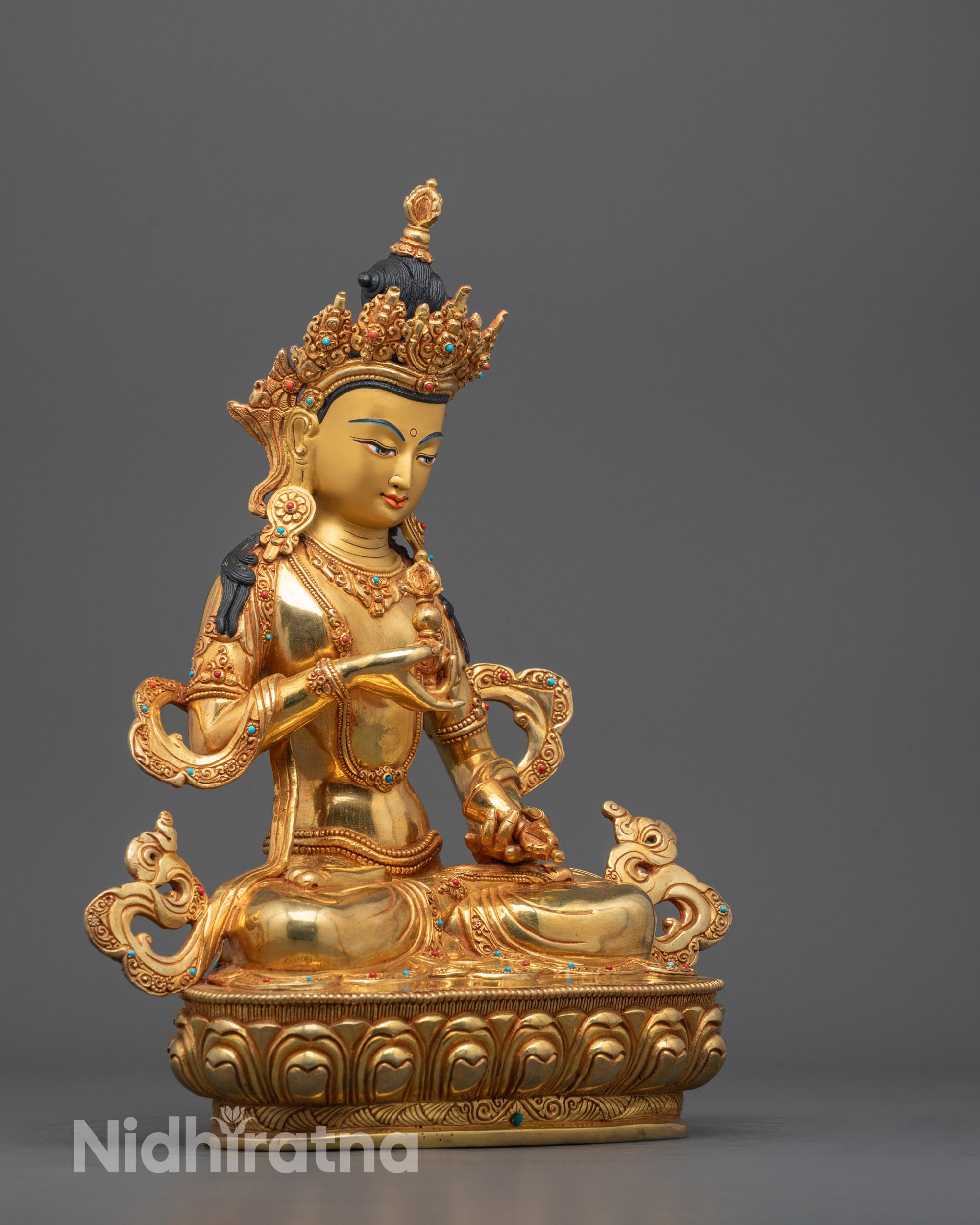 Side profile of the Vajrasattva Statue revealing intricate lotus seat carvings