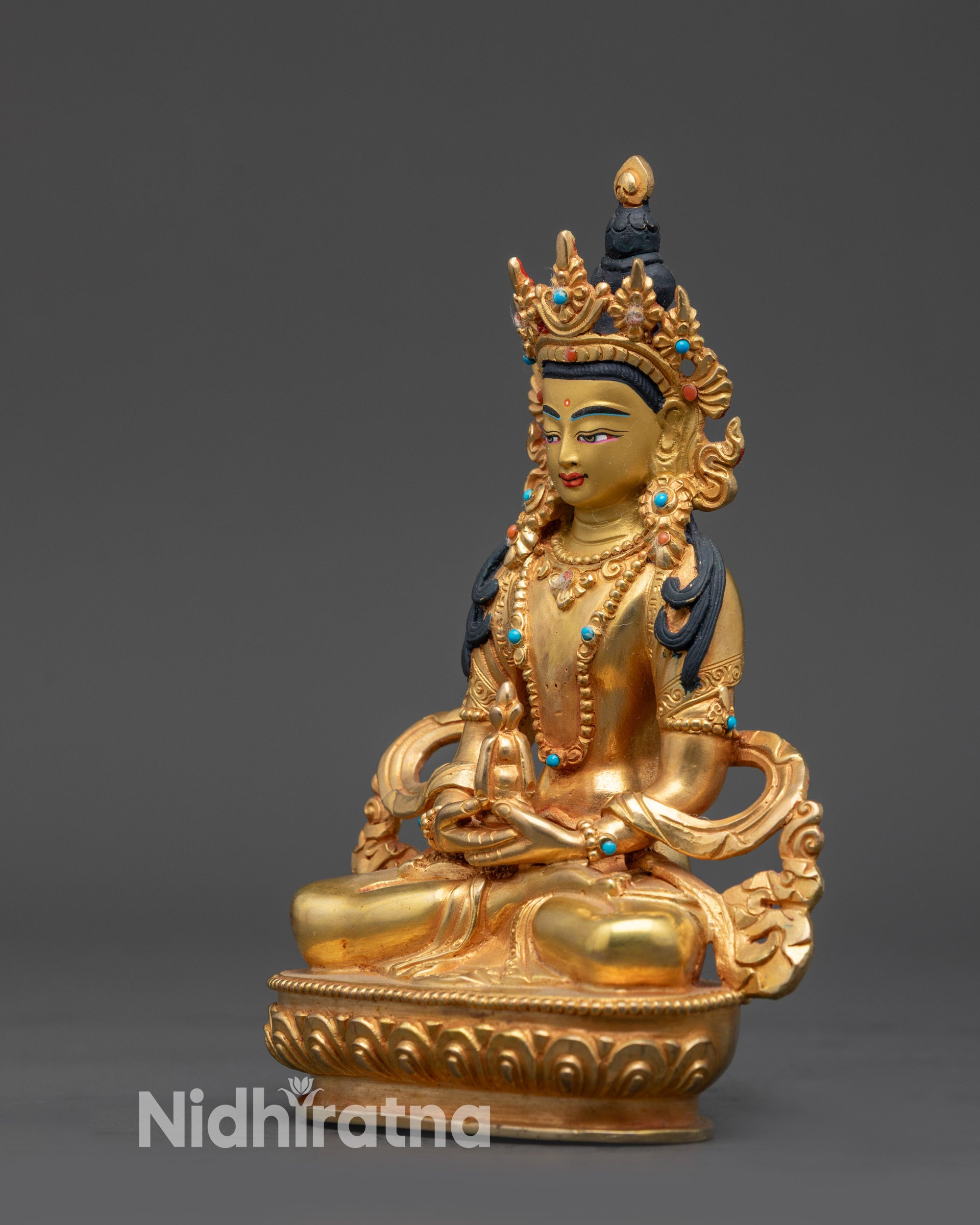 Side view 24K gold fire-gilded Amitayus sculpture holding kalasha, Himalayan longevity deity