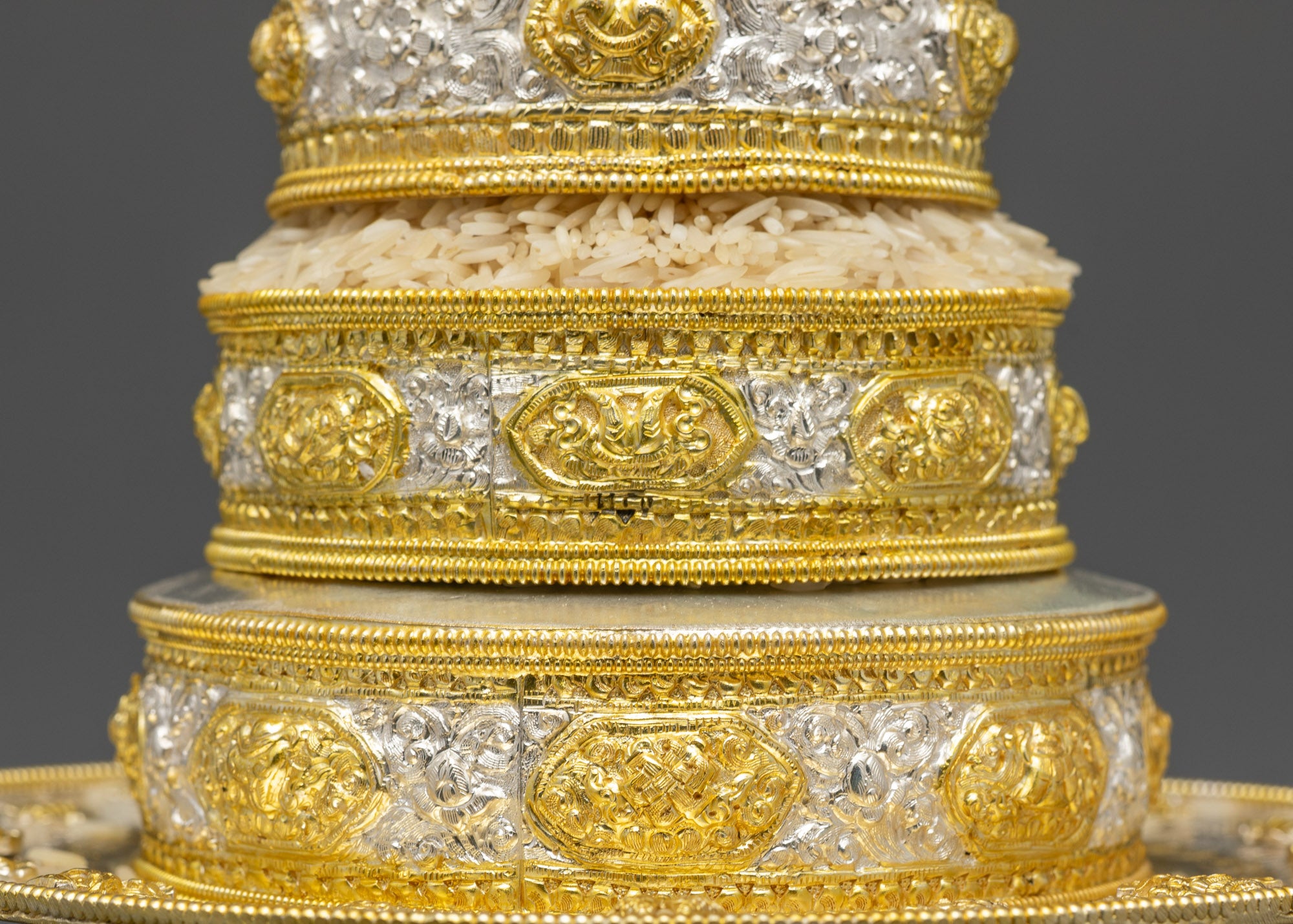 Side view 5" Tibetan Mandala with layered copper rings and pedestal base