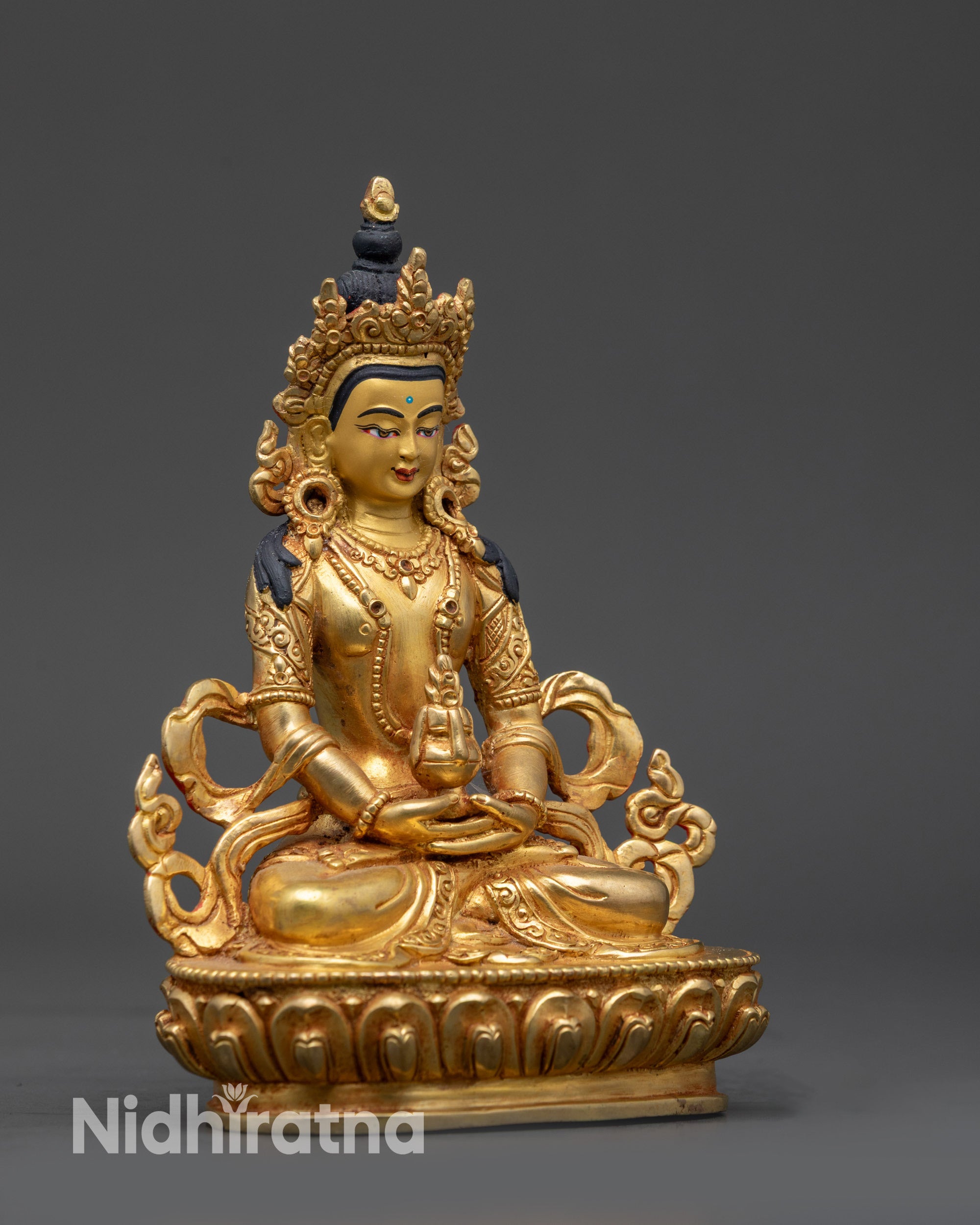 Side view Amitayus Statue holding nectar of immortality with flowing robes