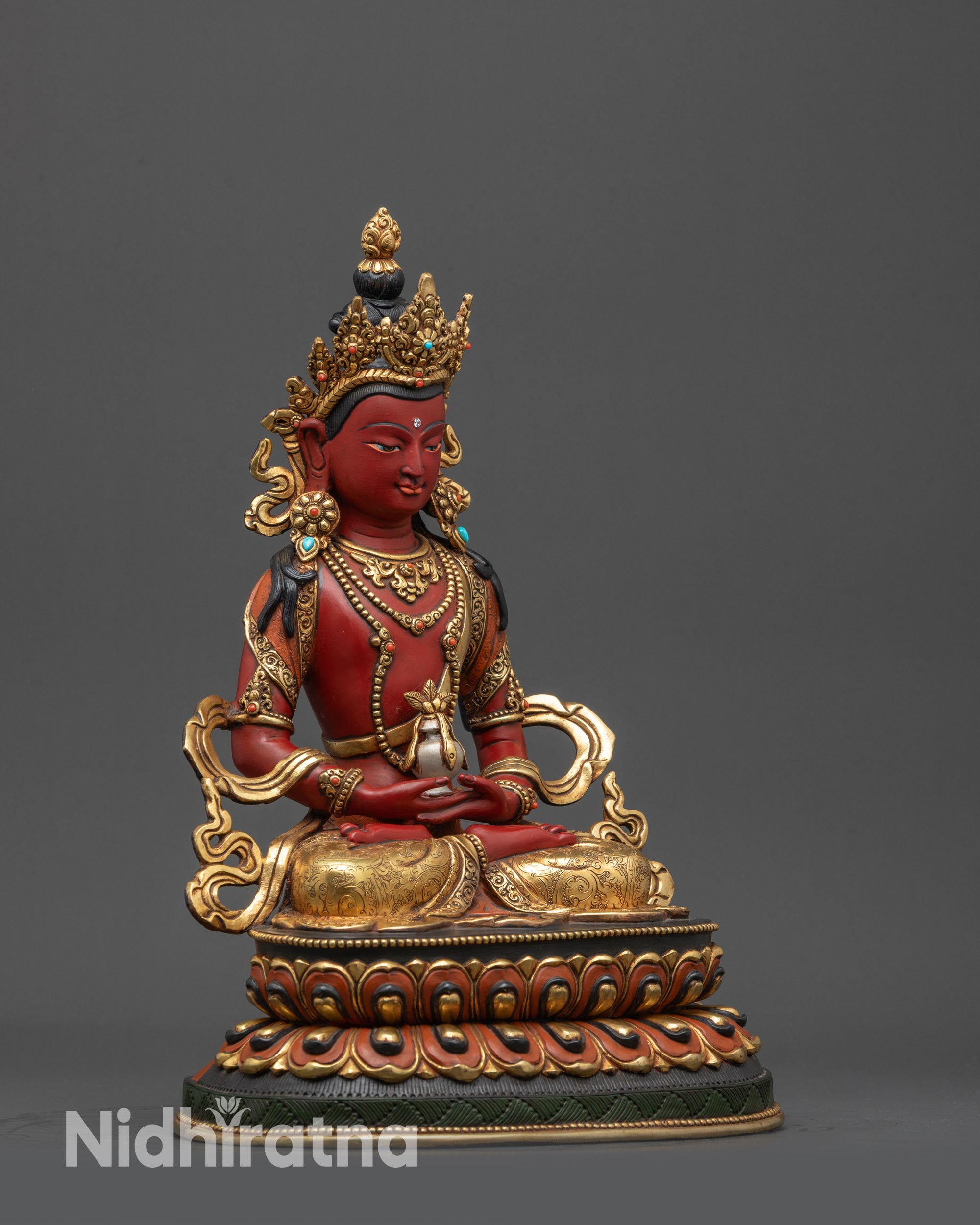 Side view Amitayus copper statue holding medicinal vase on lotus base