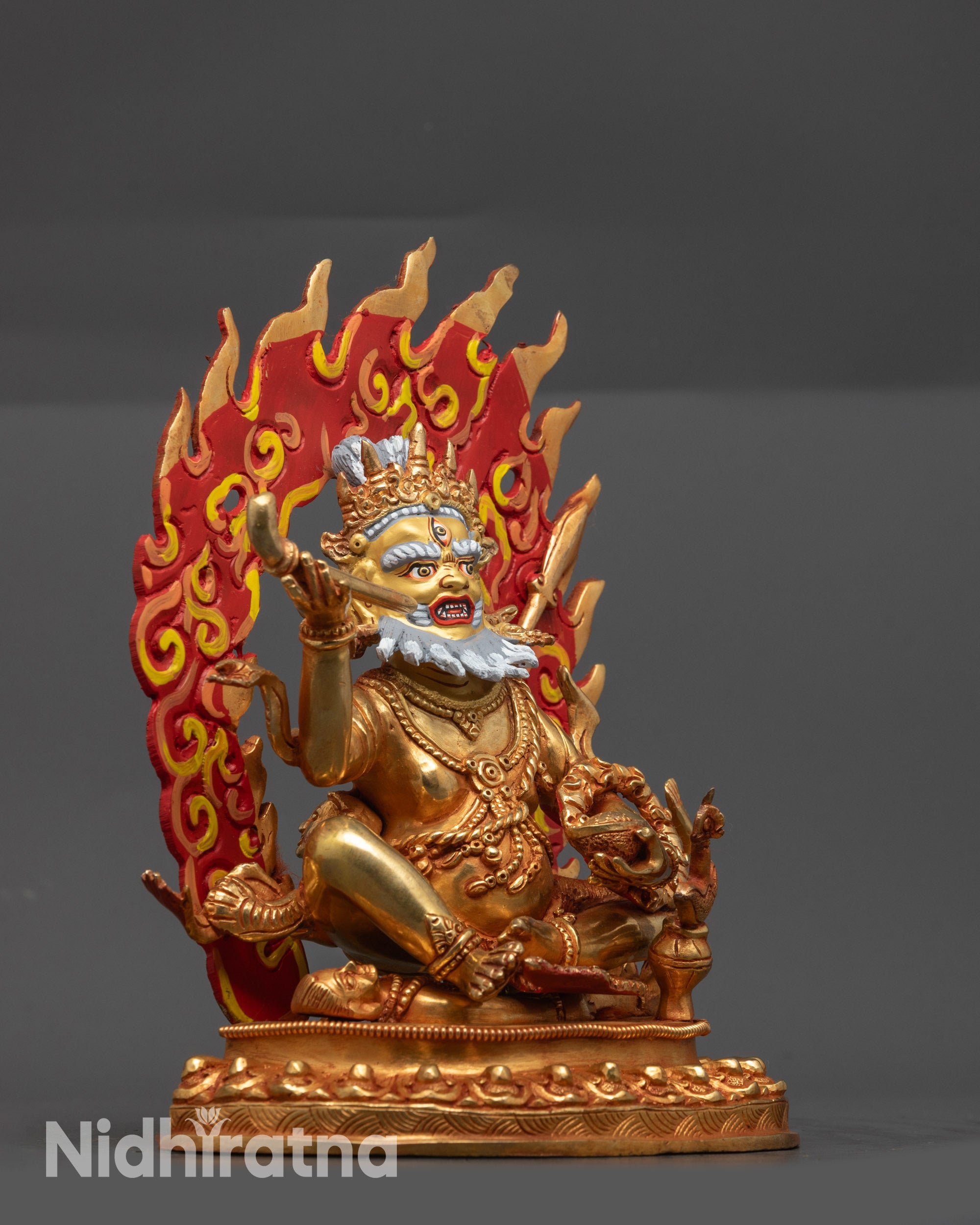 Side view Brahmanrupa Mahakala holding skull cup and thighbone trumpet in Lalita Asana