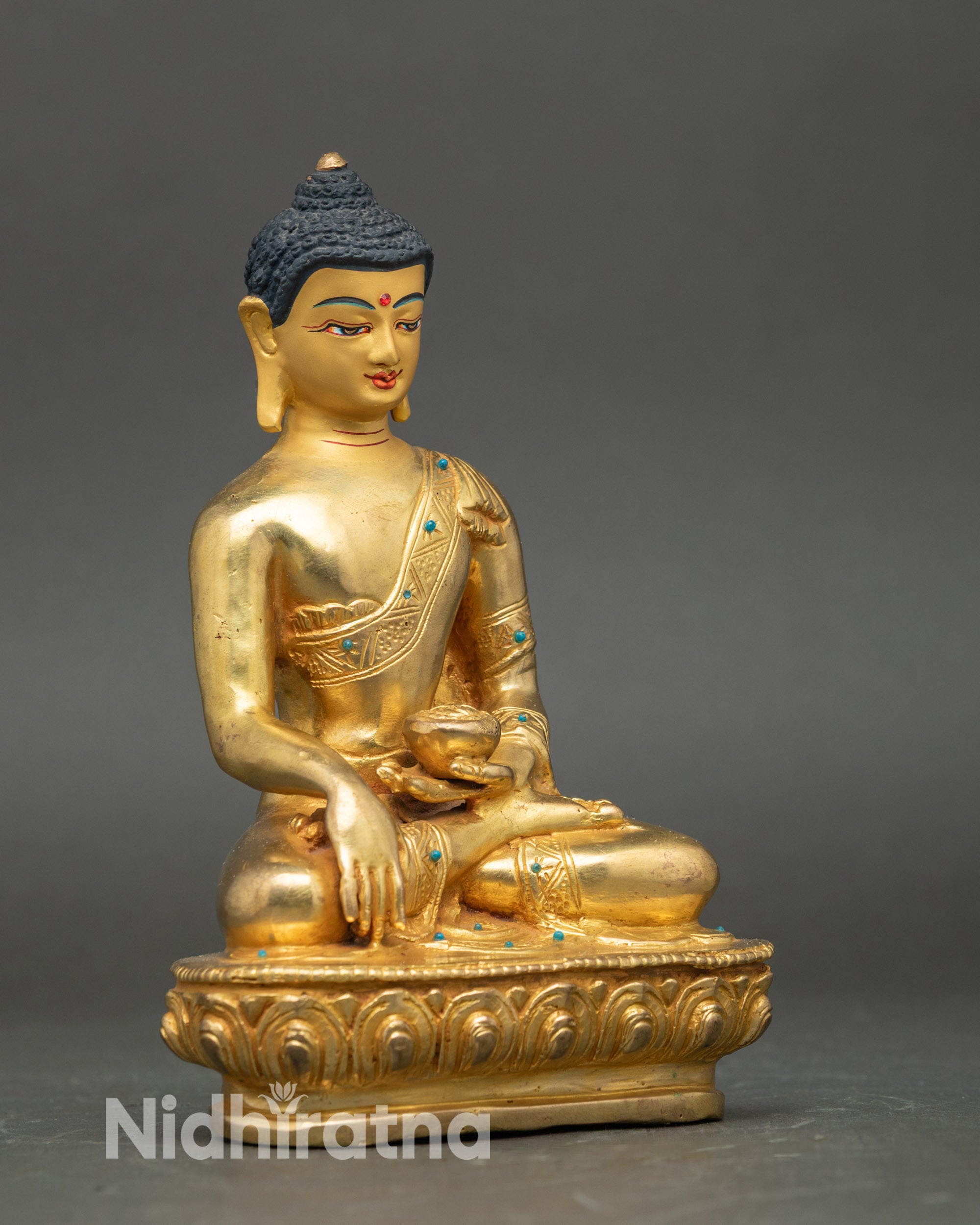 Side view – Copper Shakyamuni Buddha holding monk’s bowl, serene pose, Buddhist altar décor