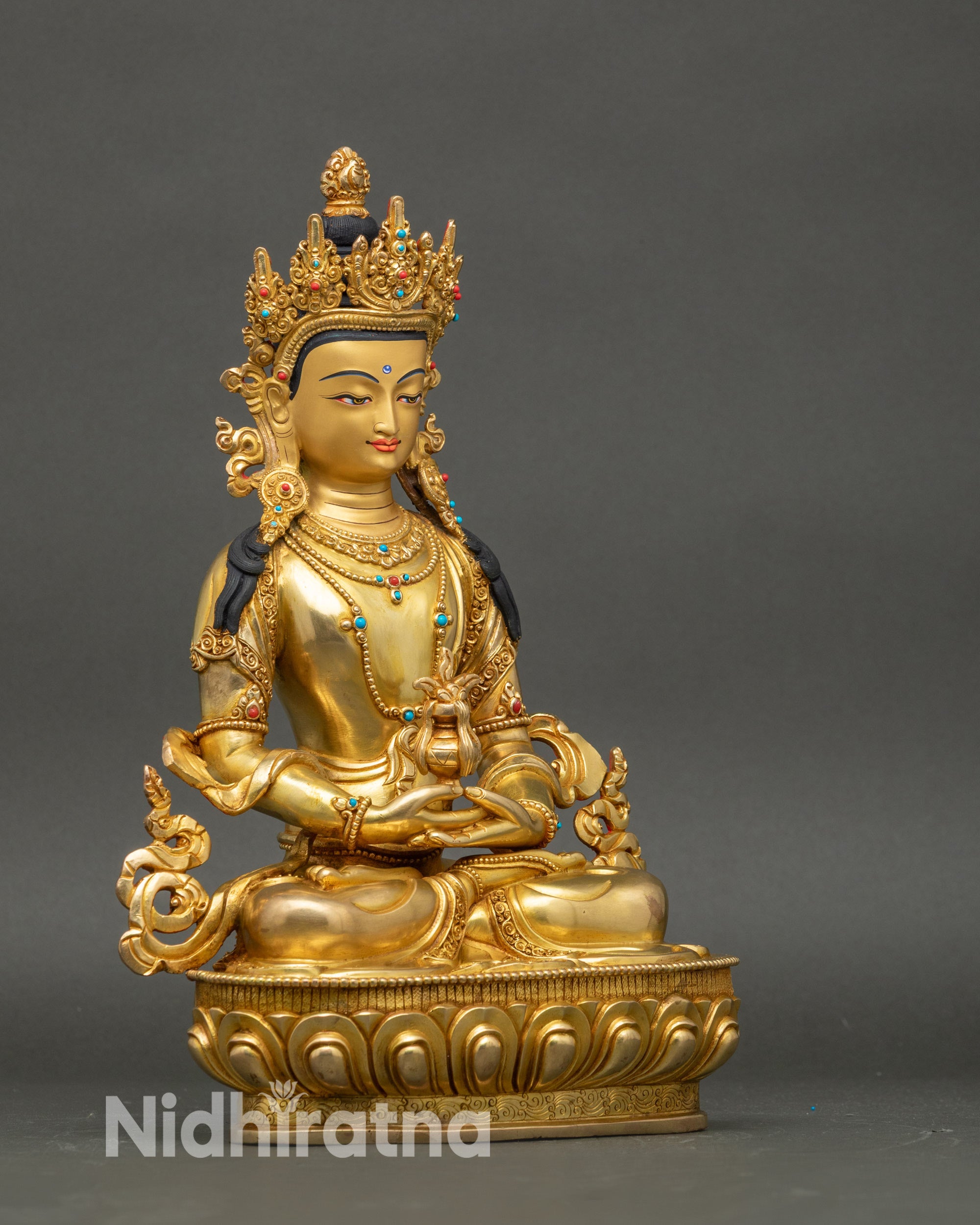 Side view β Gold Amitayus Buddha holding long-life vase, seated on lotus, meditation altar
