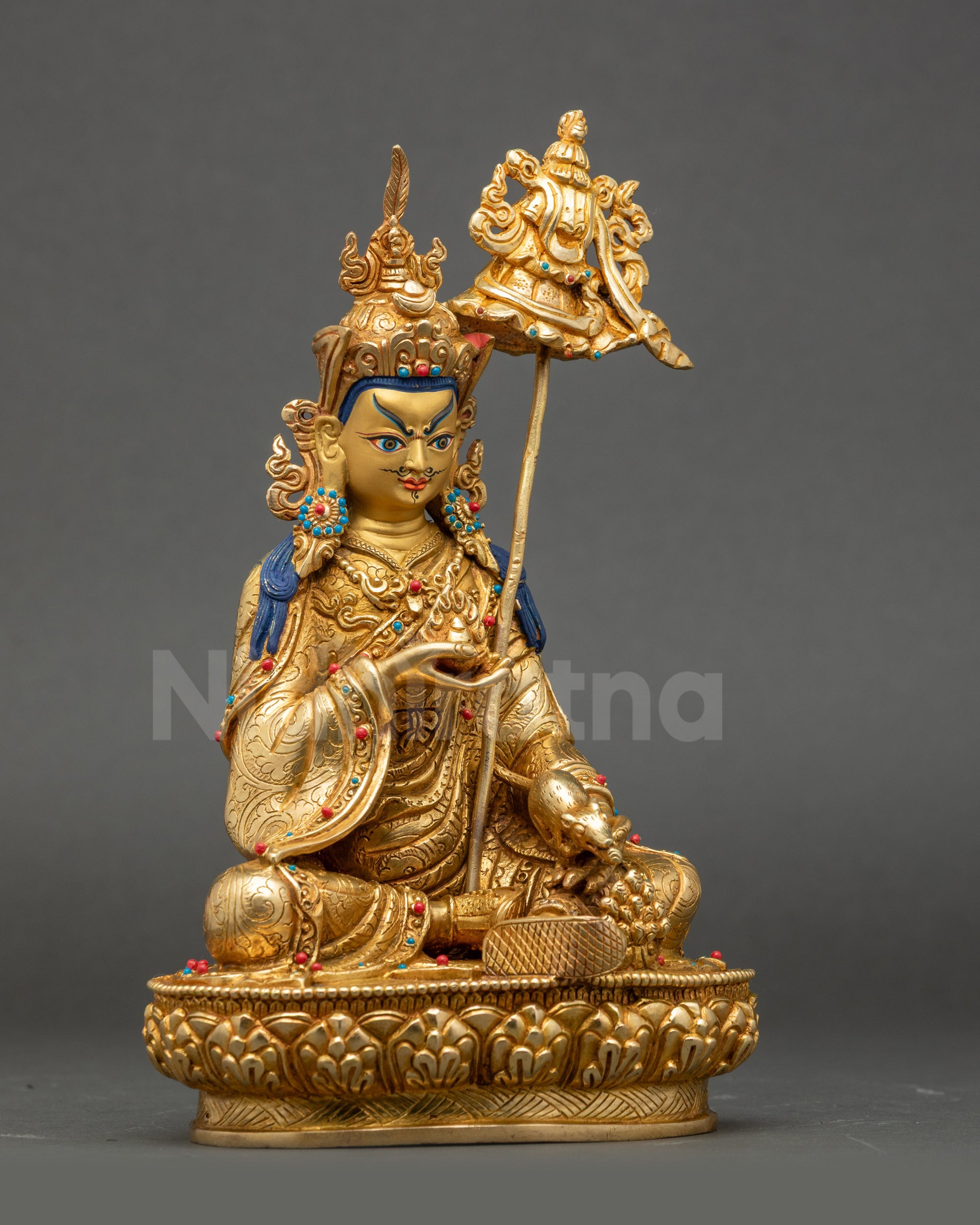Side view Guru Norlha Wealth Deity Statue, holding Chintamani and jewel-spitting mongoose