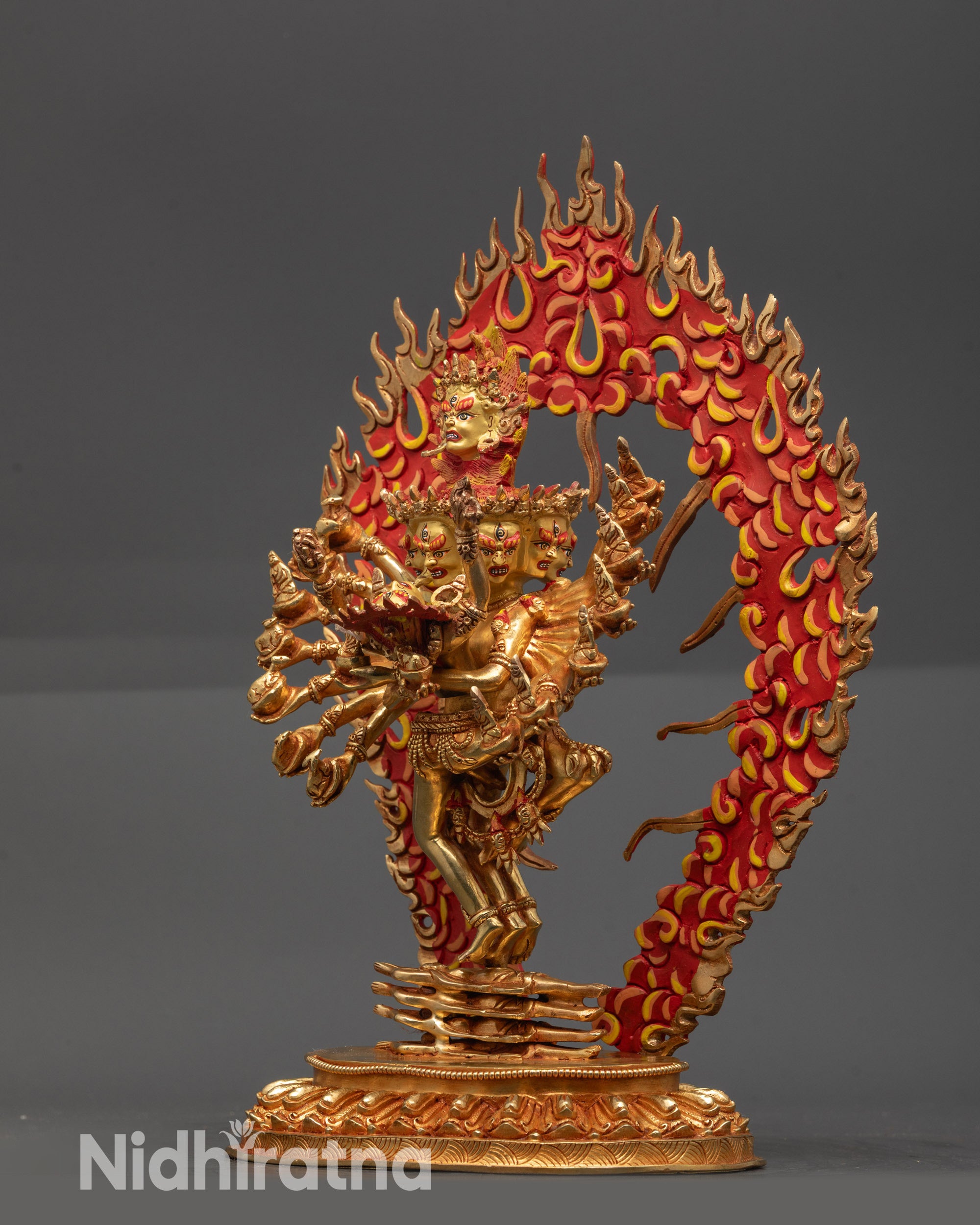Side view Hevajra Statue with sixteen arms, carved robe and flowing ornaments