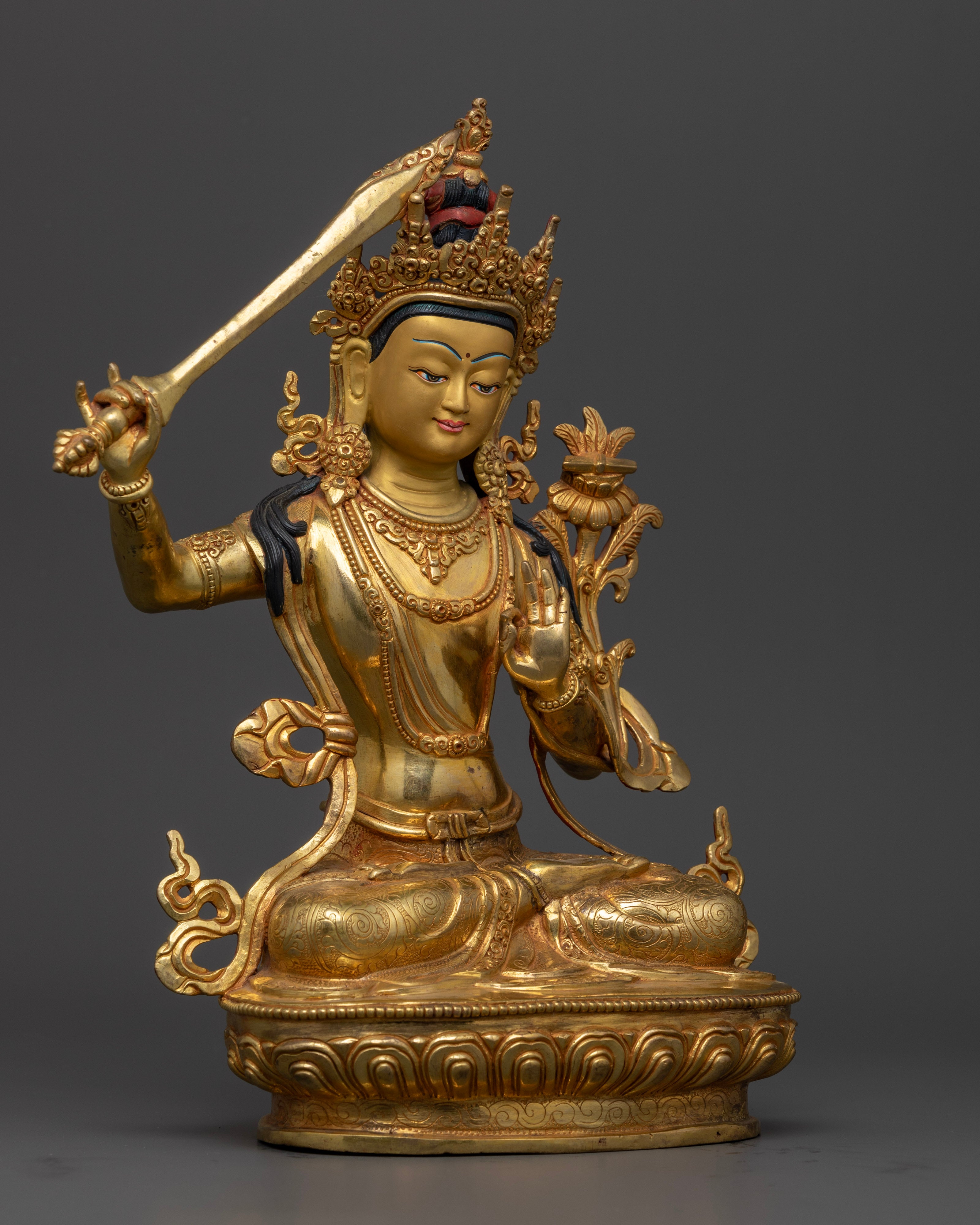 Side view Manjushri Buddha statue copper gilded wisdom sword lotus Nepal artisan