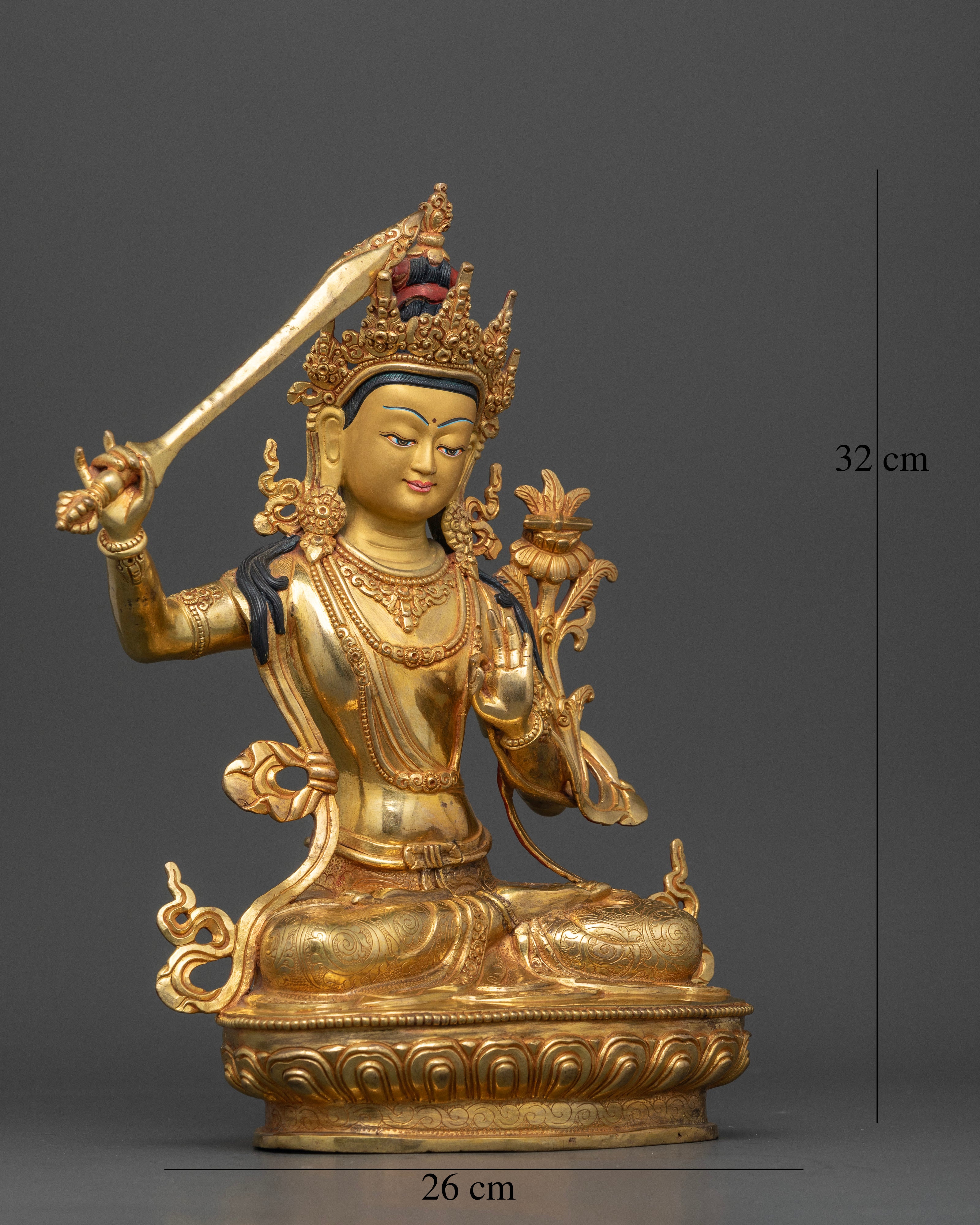 Side view Manjushri Buddha statue gold gilded copper robes detail Newari artisan Nepal