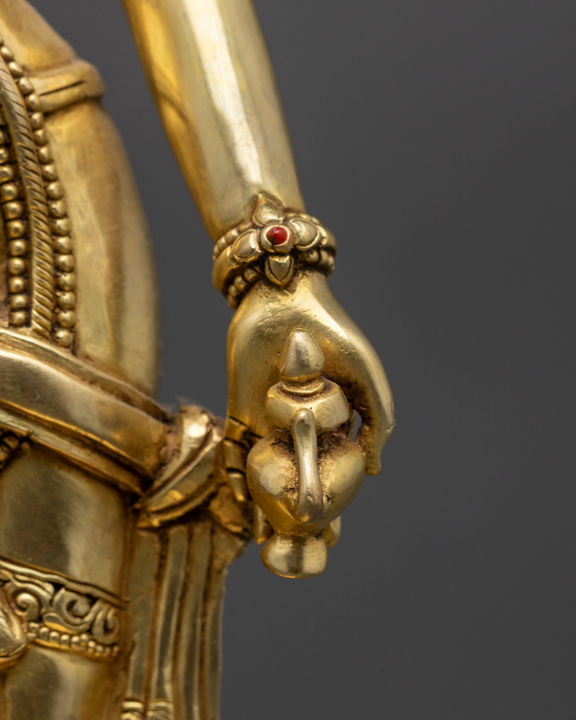Side view Manjushri from Eight Bodhisattvas collection holding utpala flower