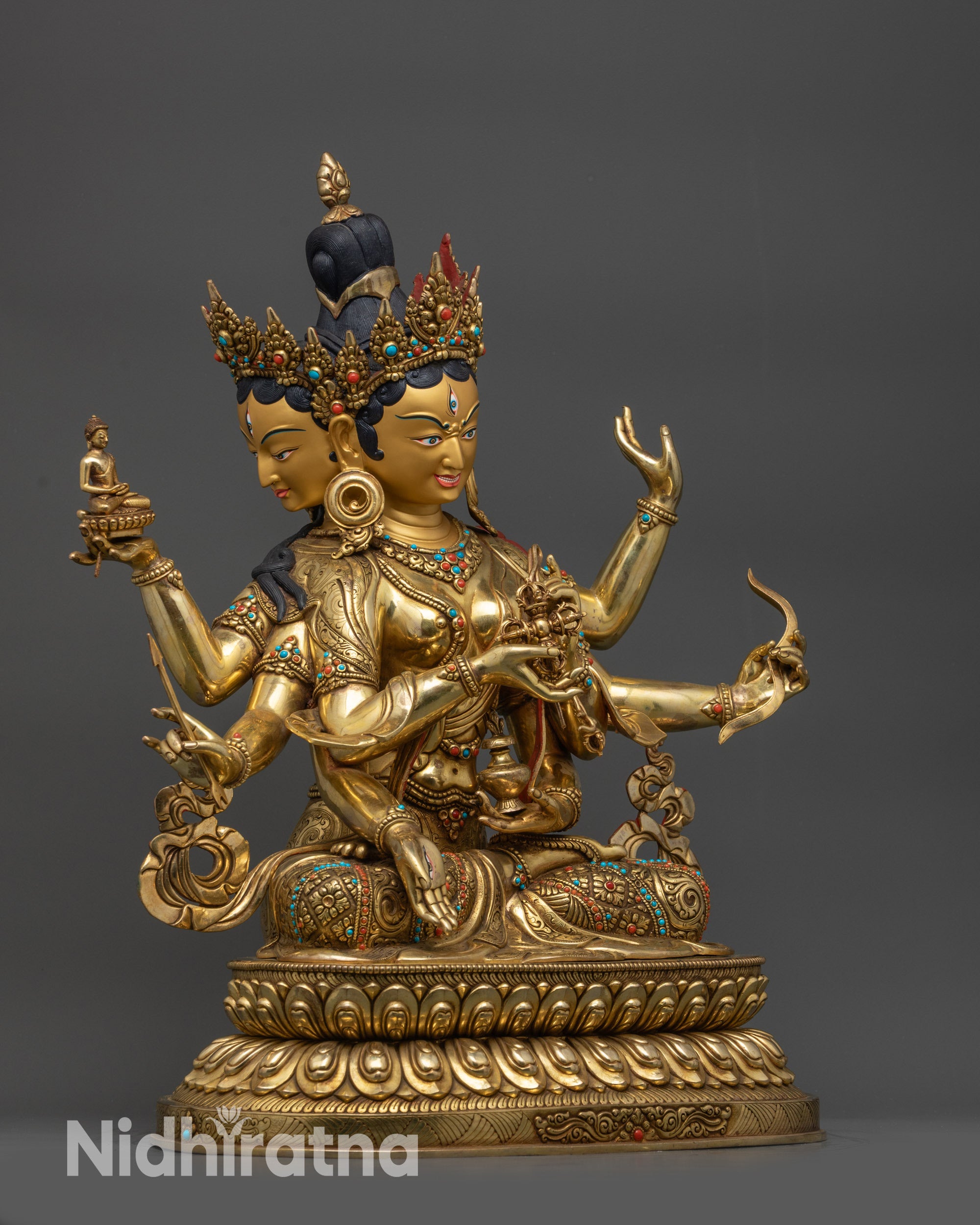 Side view Namgyalma statue seated on double-layered lotus for spiritual blessings