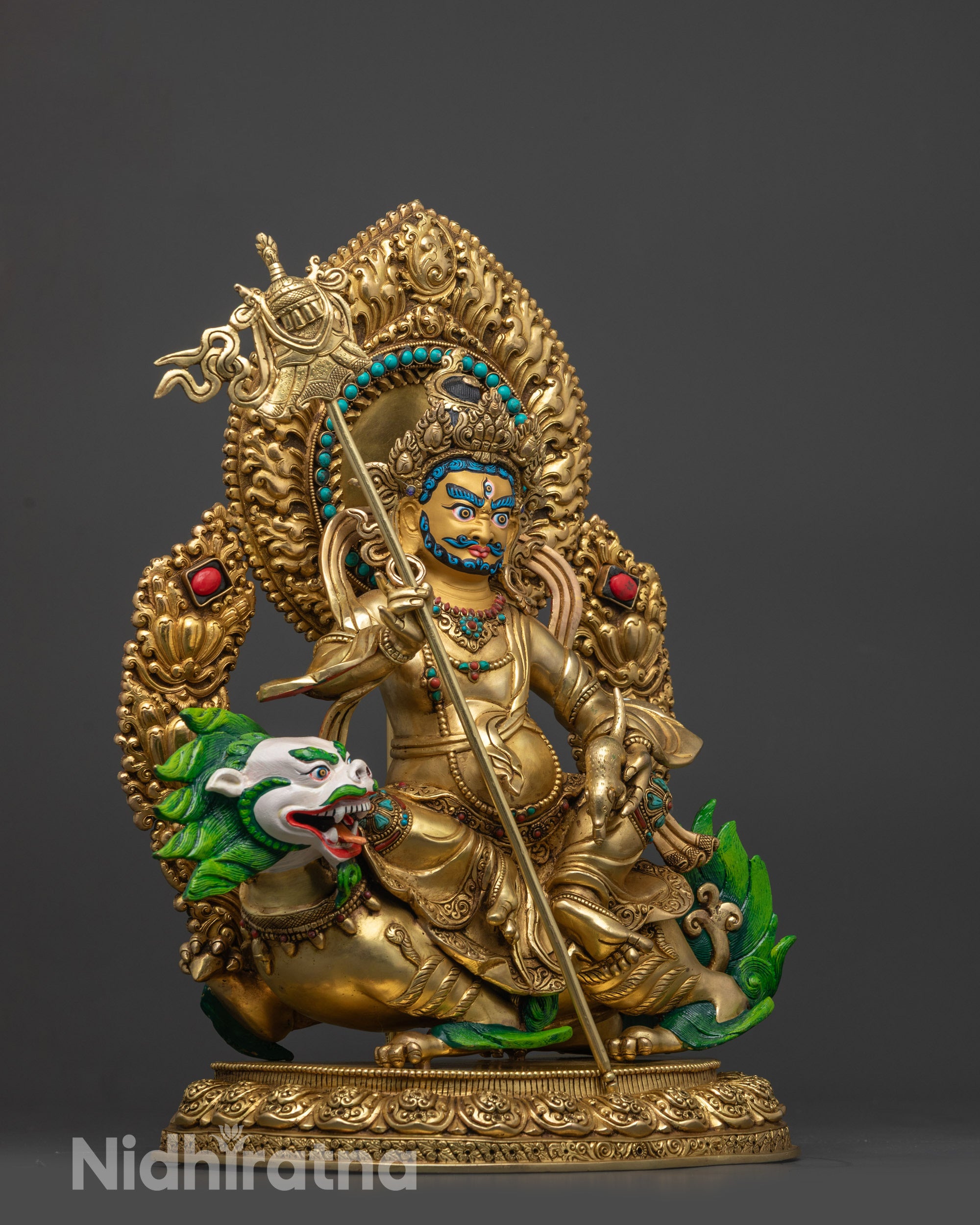 Side view Namtoshe Statue seated on snow lion holding Victory Banner and Mongoose