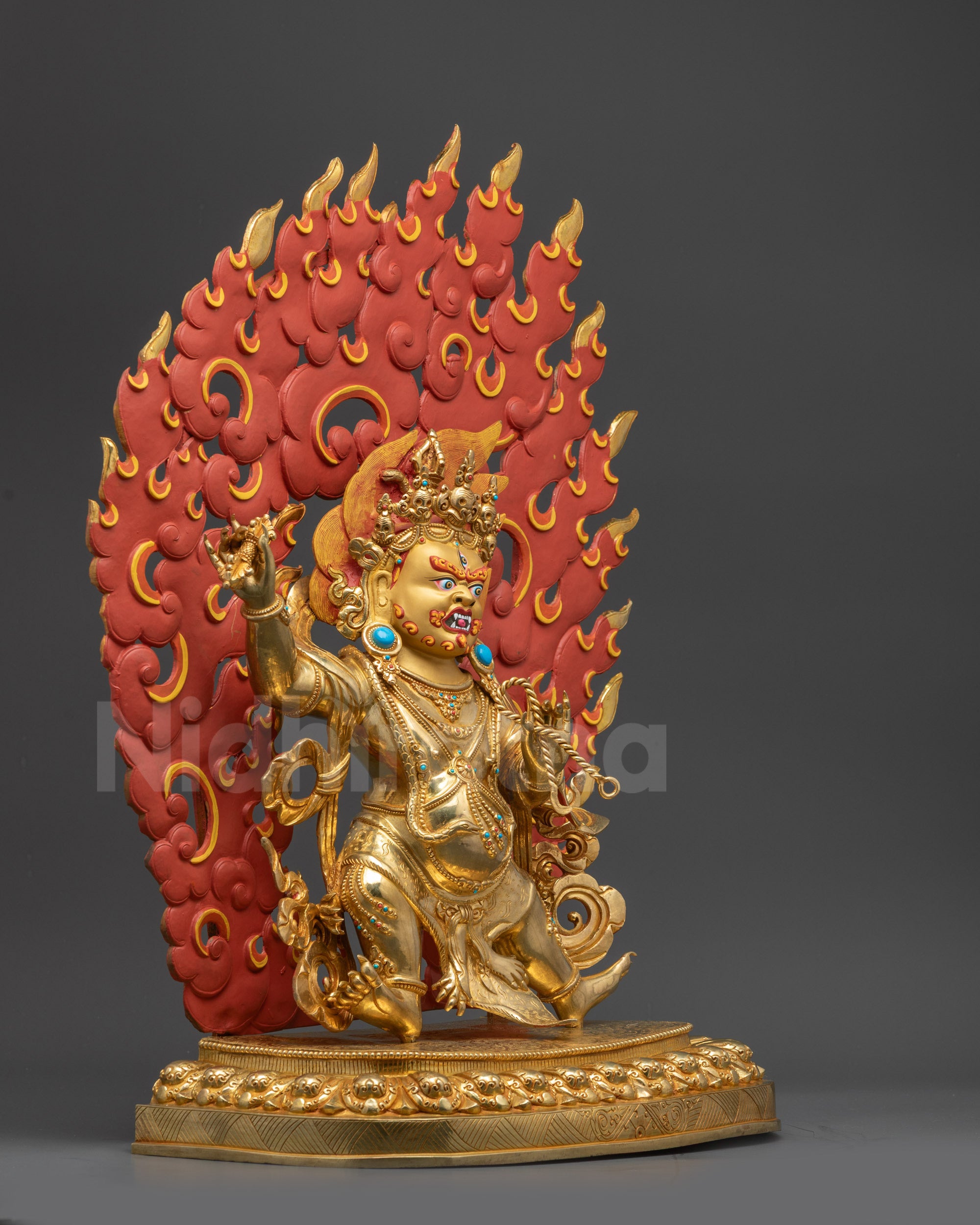 Side view Nepalese Vajrapani sculpture in dynamic dancing posture with halo