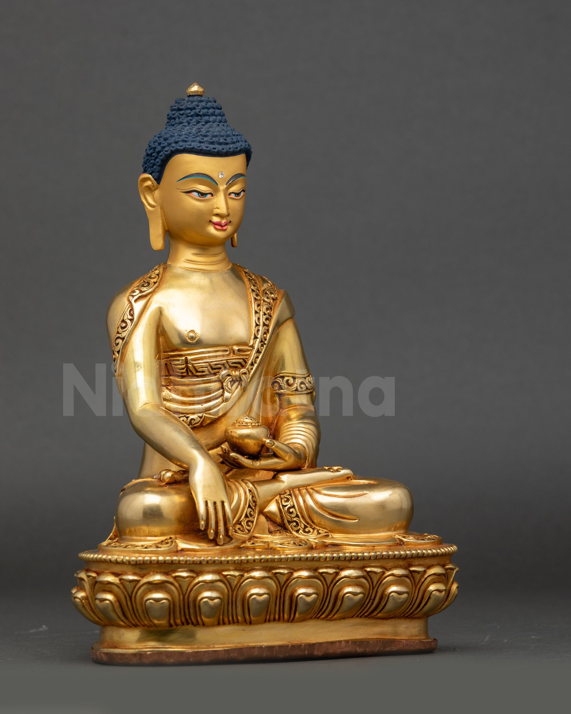 Side view Shakyamuni Buddha in vajra posture holding alms bowl, meditation statue