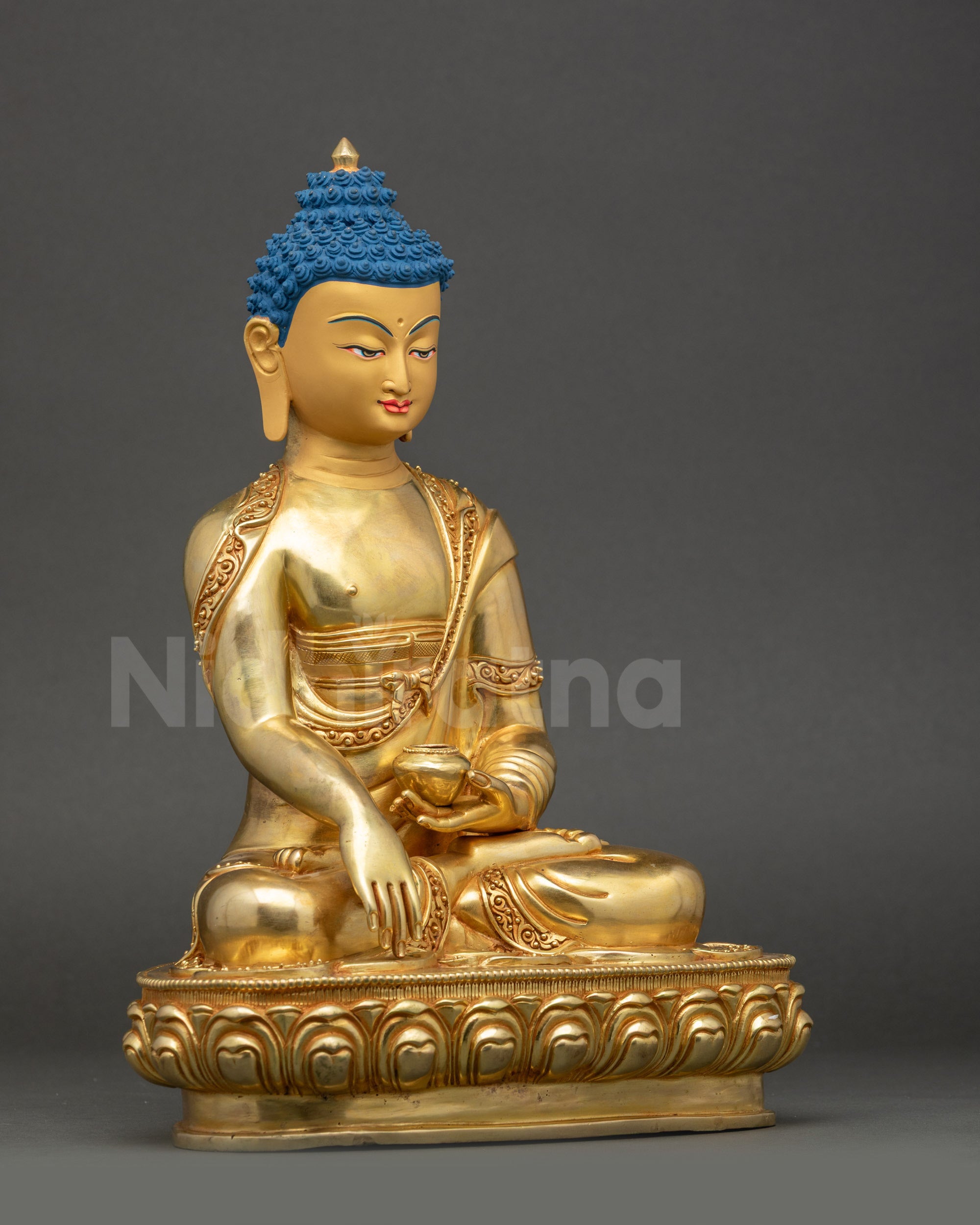 Side view Shakyamuni Buddha statue gold-finished handmade by Newari artisan