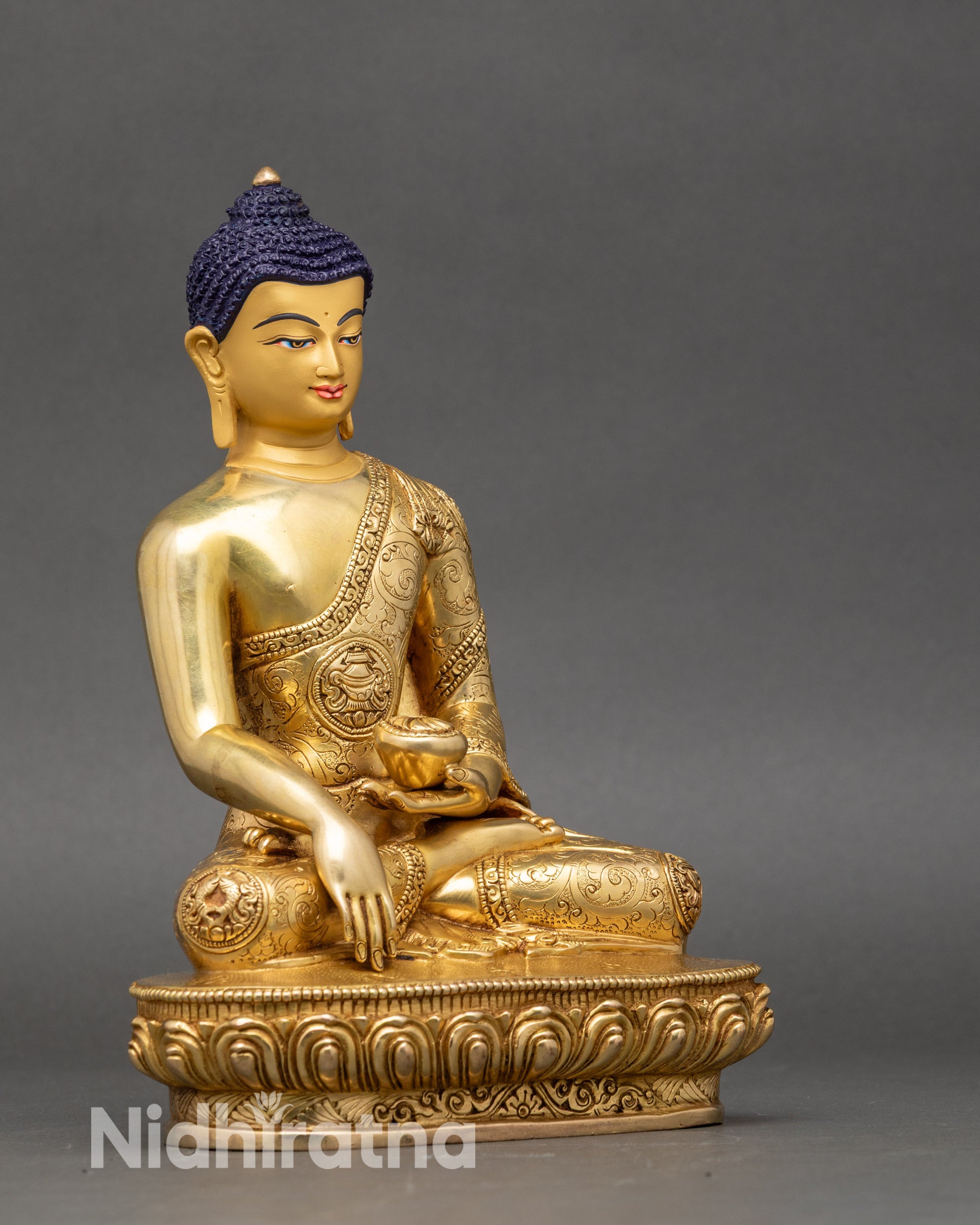 Side view Shakyamuni Buddha statue monkβs robe carved with Eight Auspicious Symbols