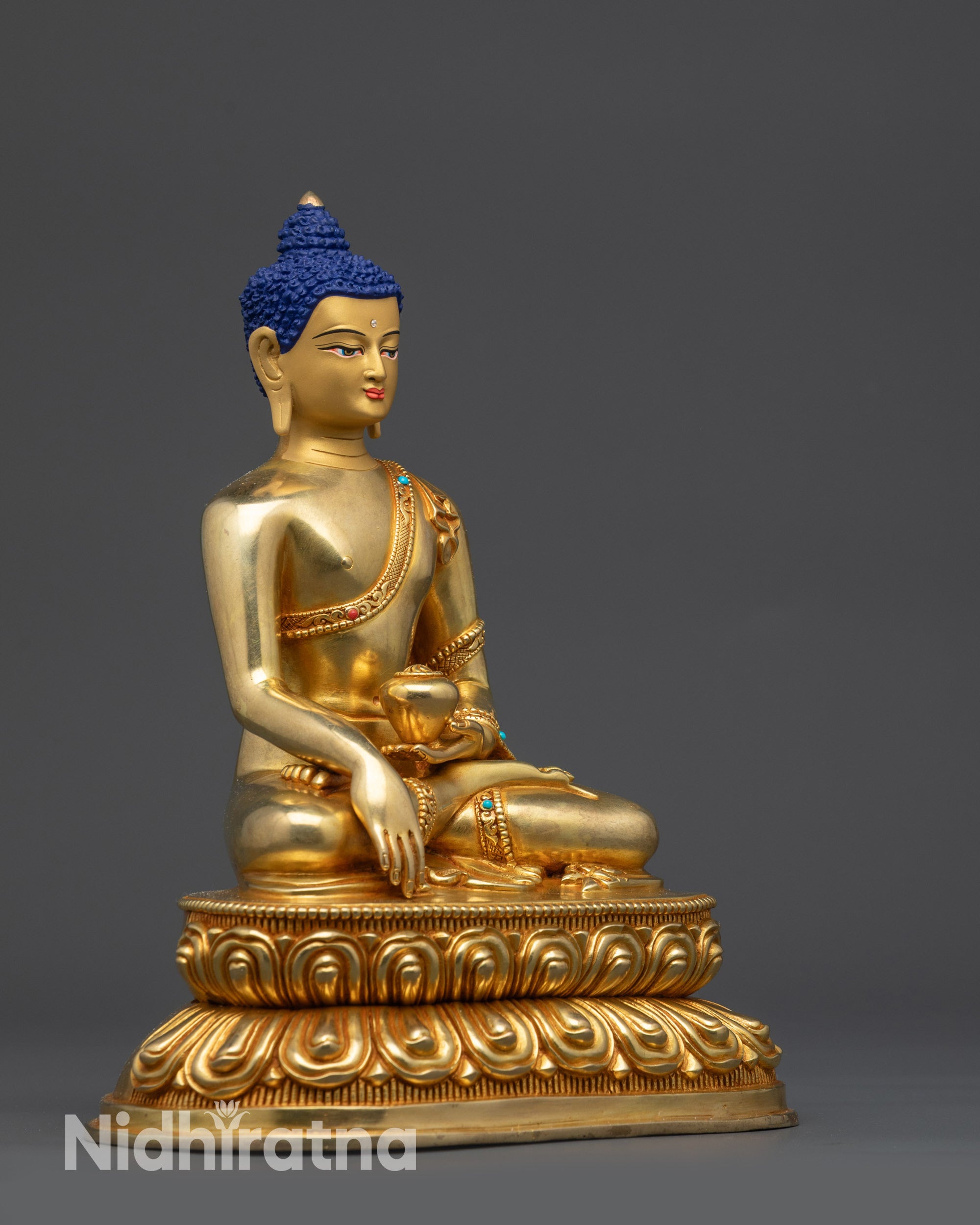Side view Tibetan Buddhist Shakyamuni Buddha seated on double-layered lotus