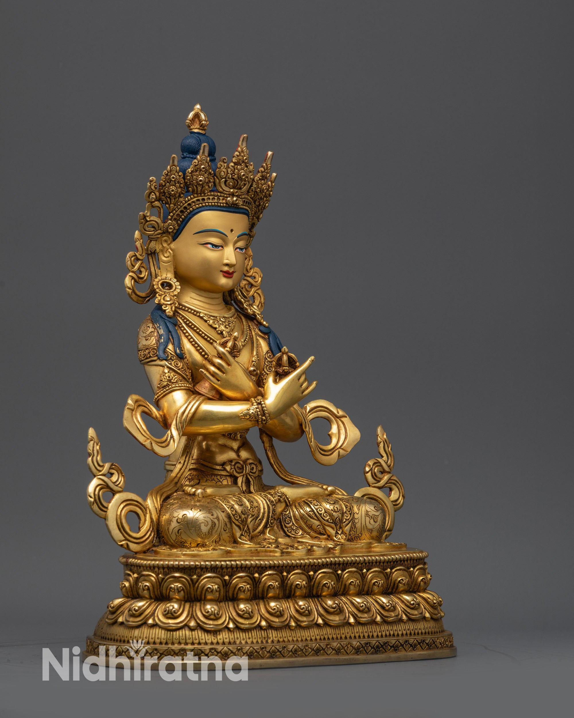Side view Vajradhara Buddha holding vajra and bell in arms-crossed position