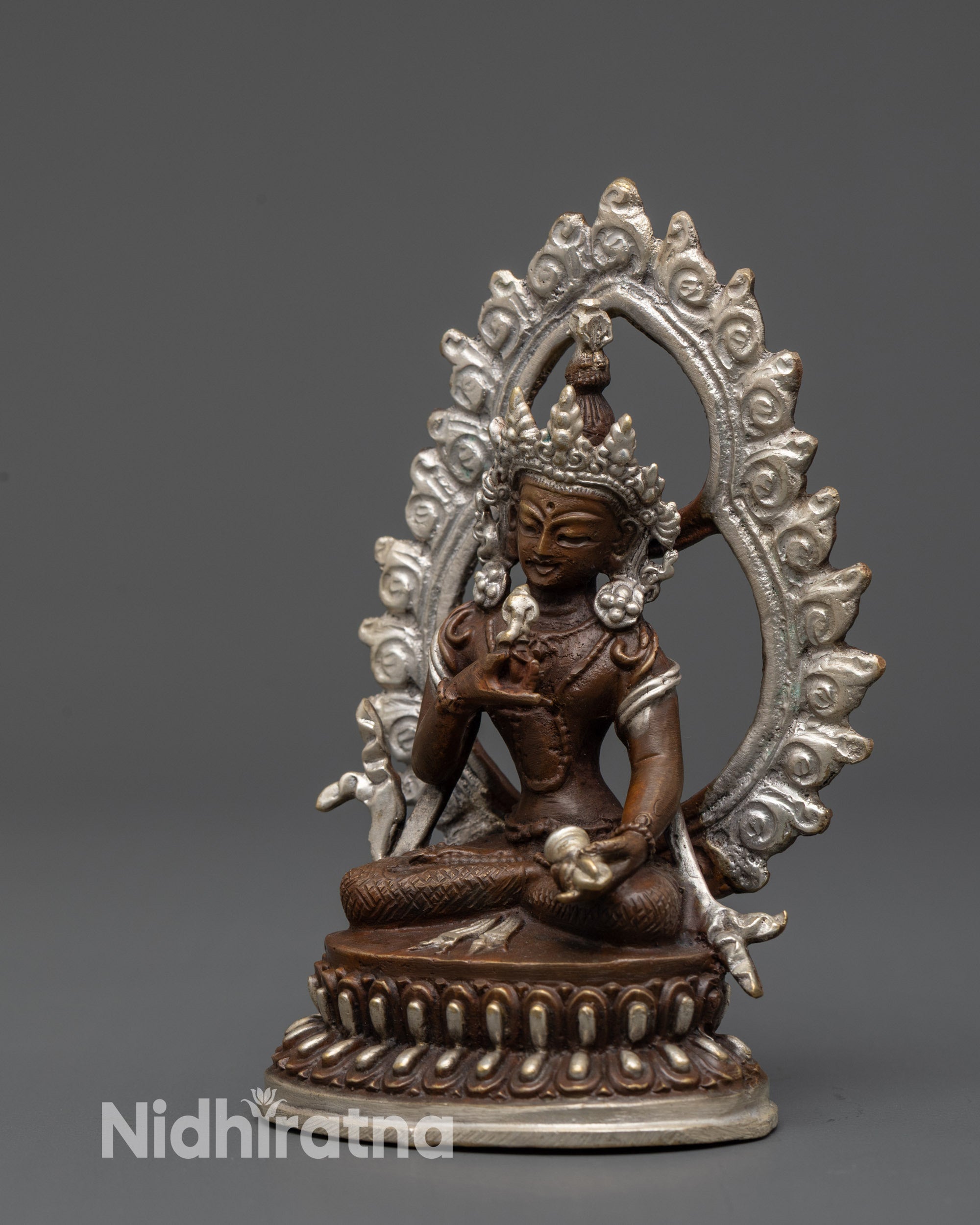 Side view Vajrasattva sculpture seated on double-layered lotus seat