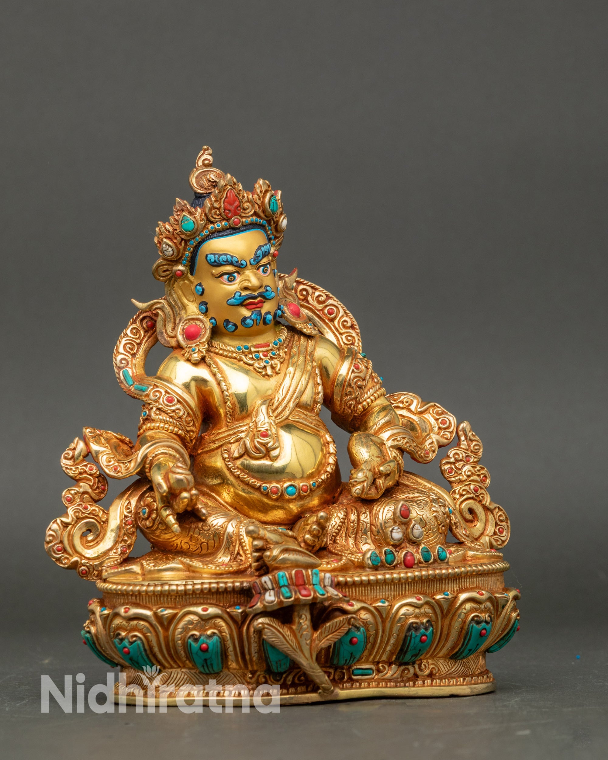 Side view Yellow Dzambhala seated on lotus throne wearing five-jeweled crown and jewelry