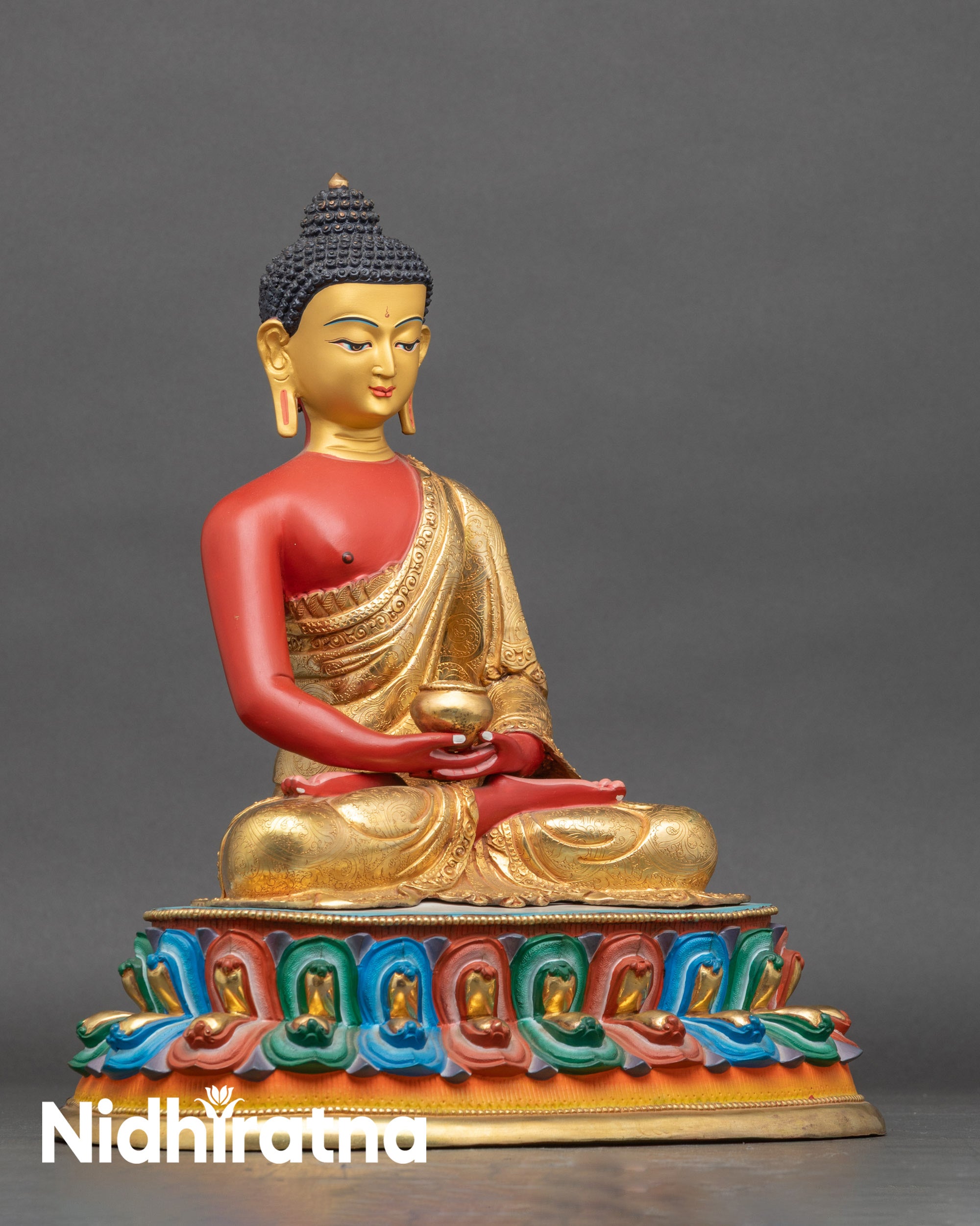 Side view of Amitabha Buddha sculpture on multi-colored double lotus seat, copper artwork