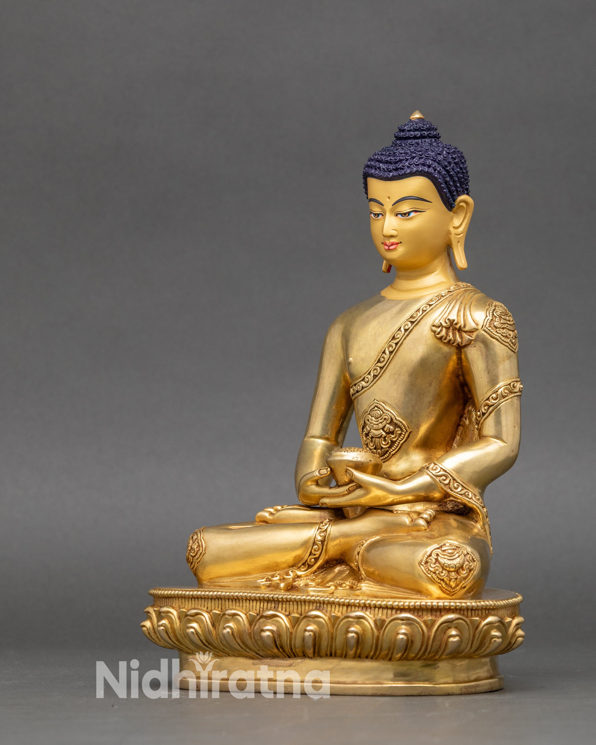 Side view of Amitabha Buddha statue, dhyana mudra, and auspicious symbols