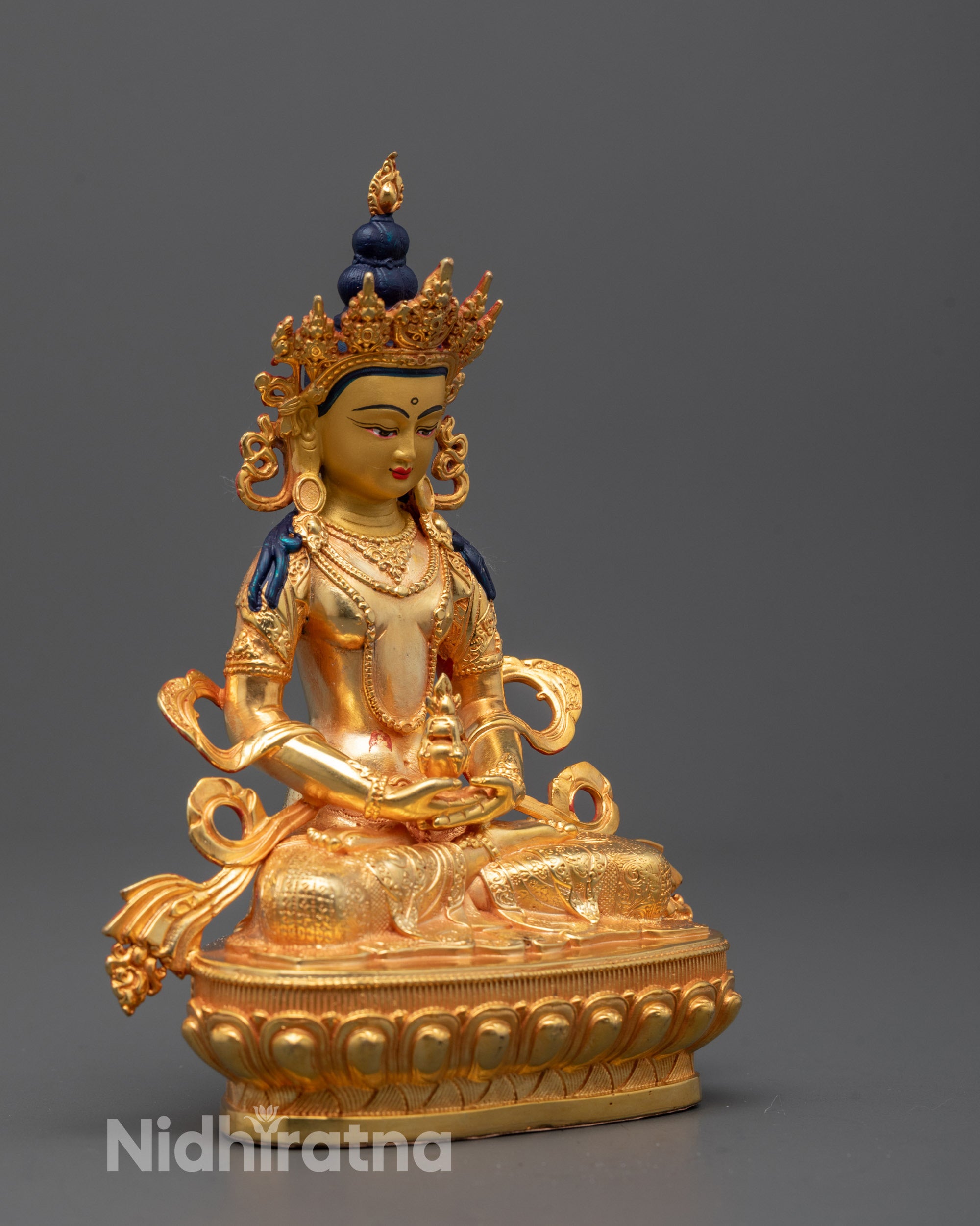 Side view of Amitayus Buddha figure symbolizing longevity and health seated peacefully