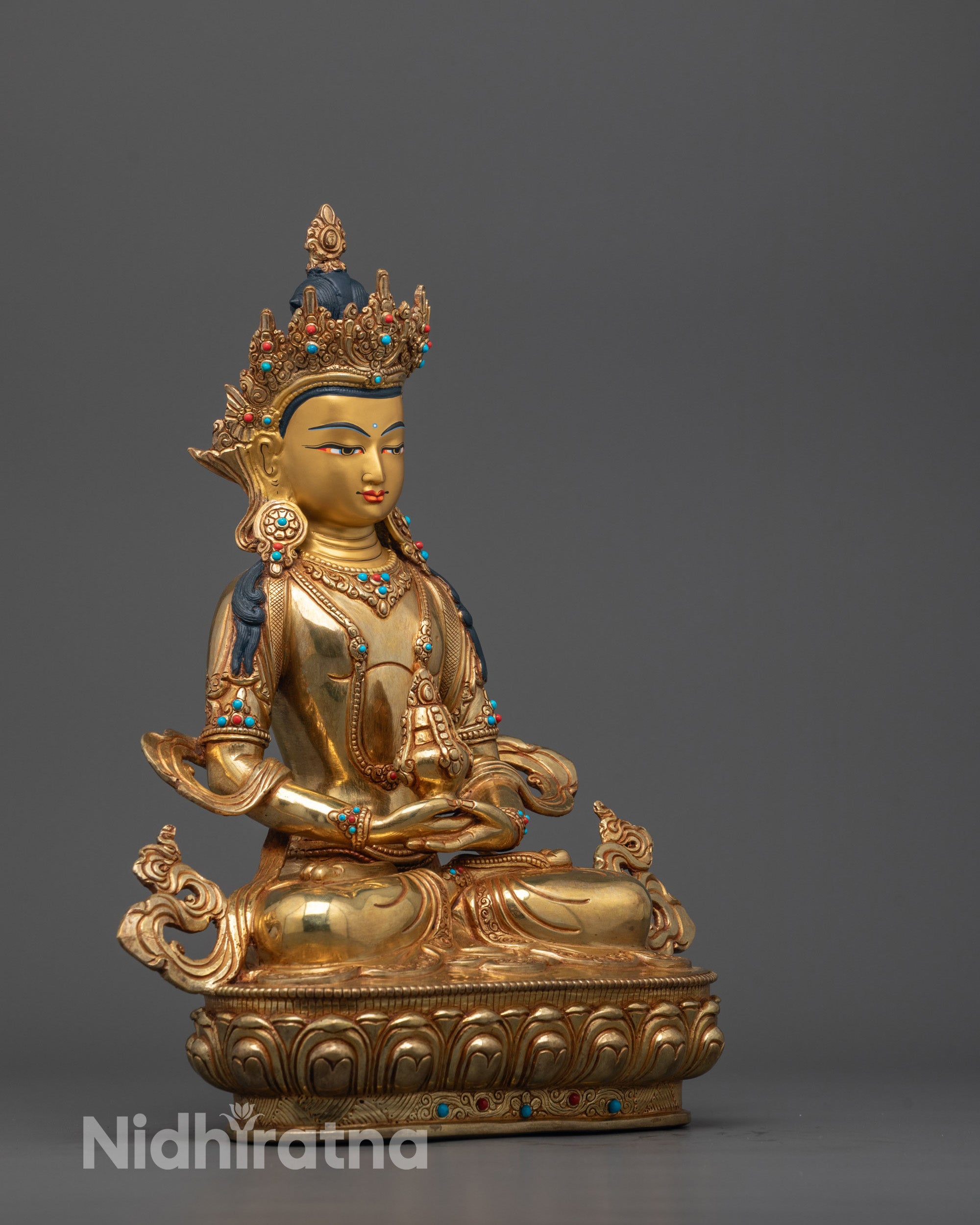 Side view of Amitayus Statue handcrafted in Nepal using the traditional lost wax method