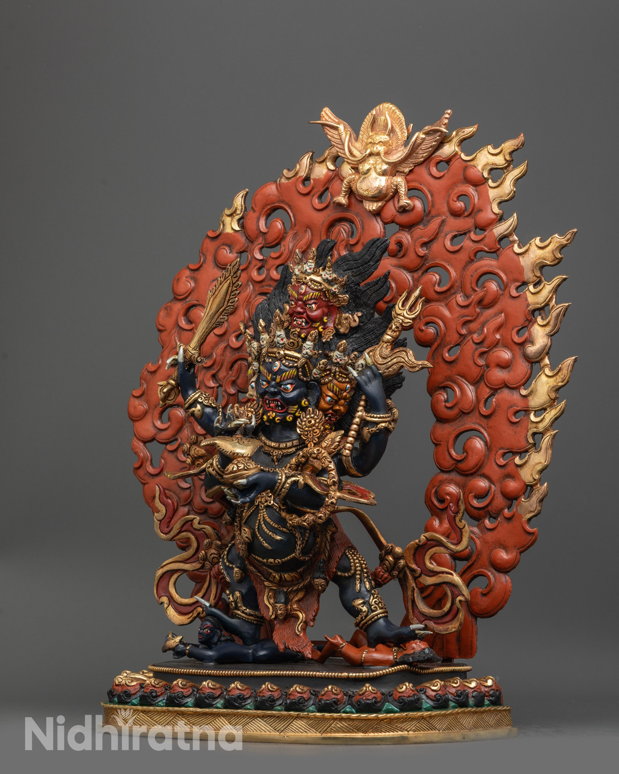 Side view of Complete Chuchepa Mahakala Statue with four arms, symbolic objects