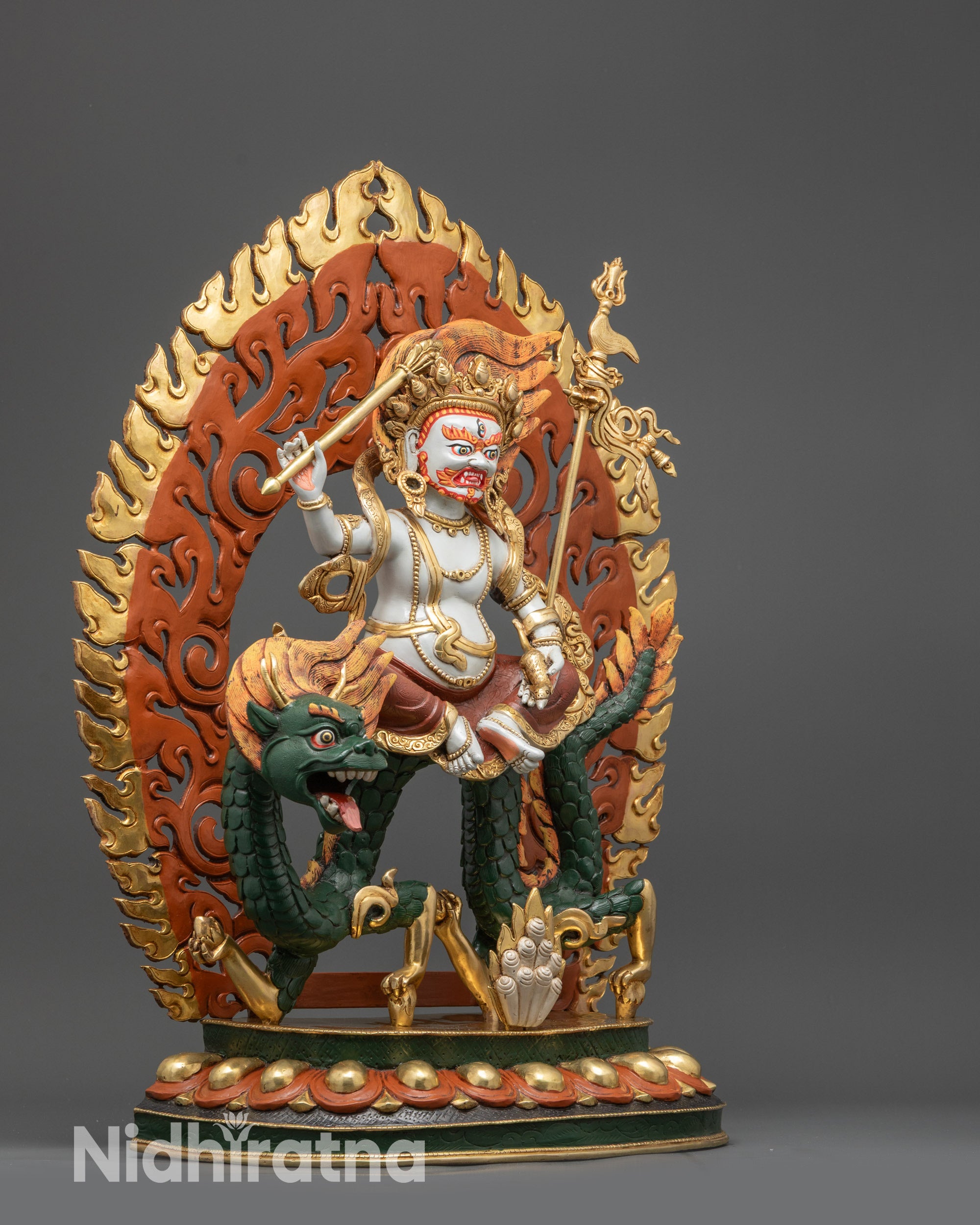 Side view of Dragon Kubera with hand-painted vibrant colors beneath White Dzambhala