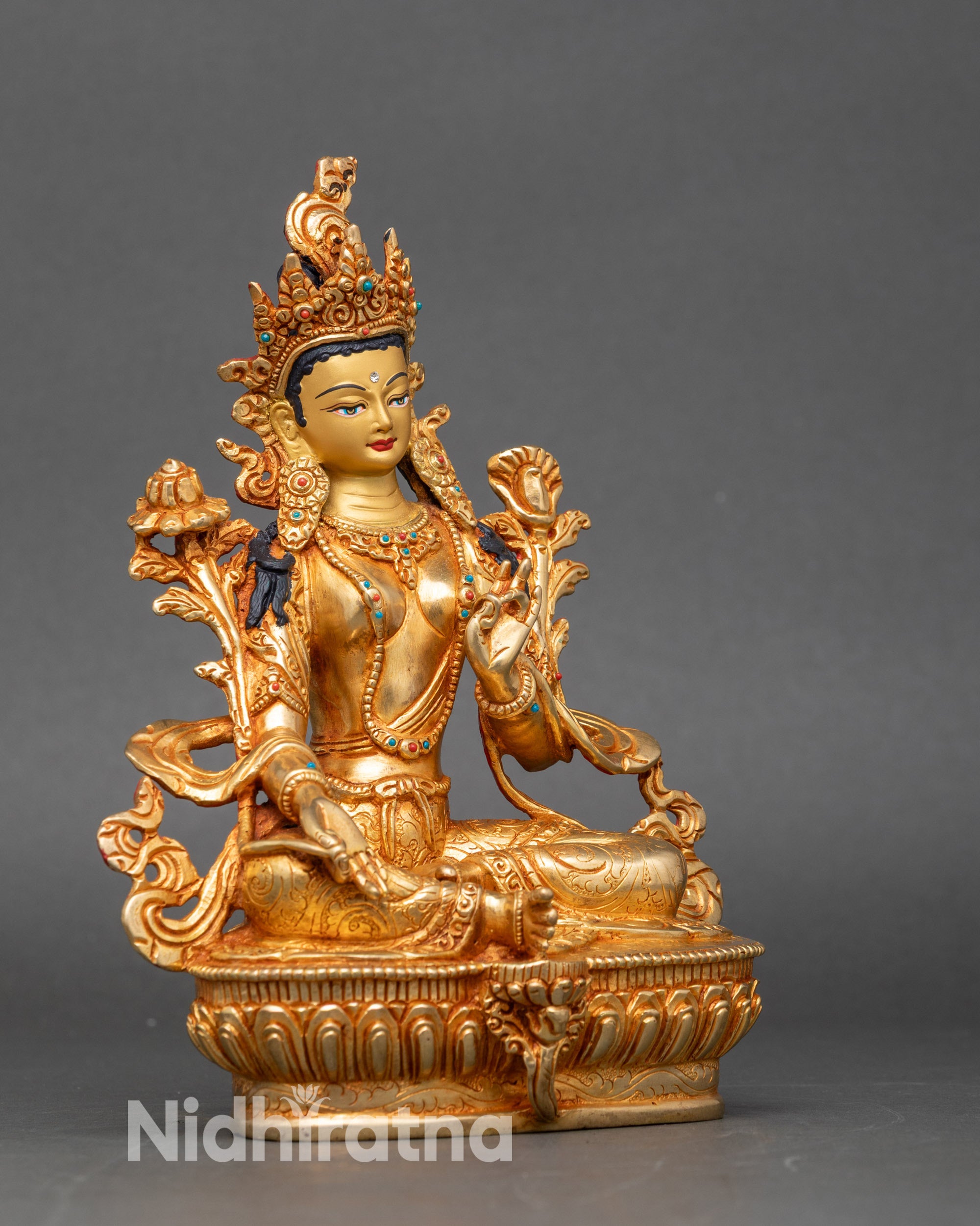Side view of Green Tara Drolma copper statue, traditional Nepalese lost-wax sculpture