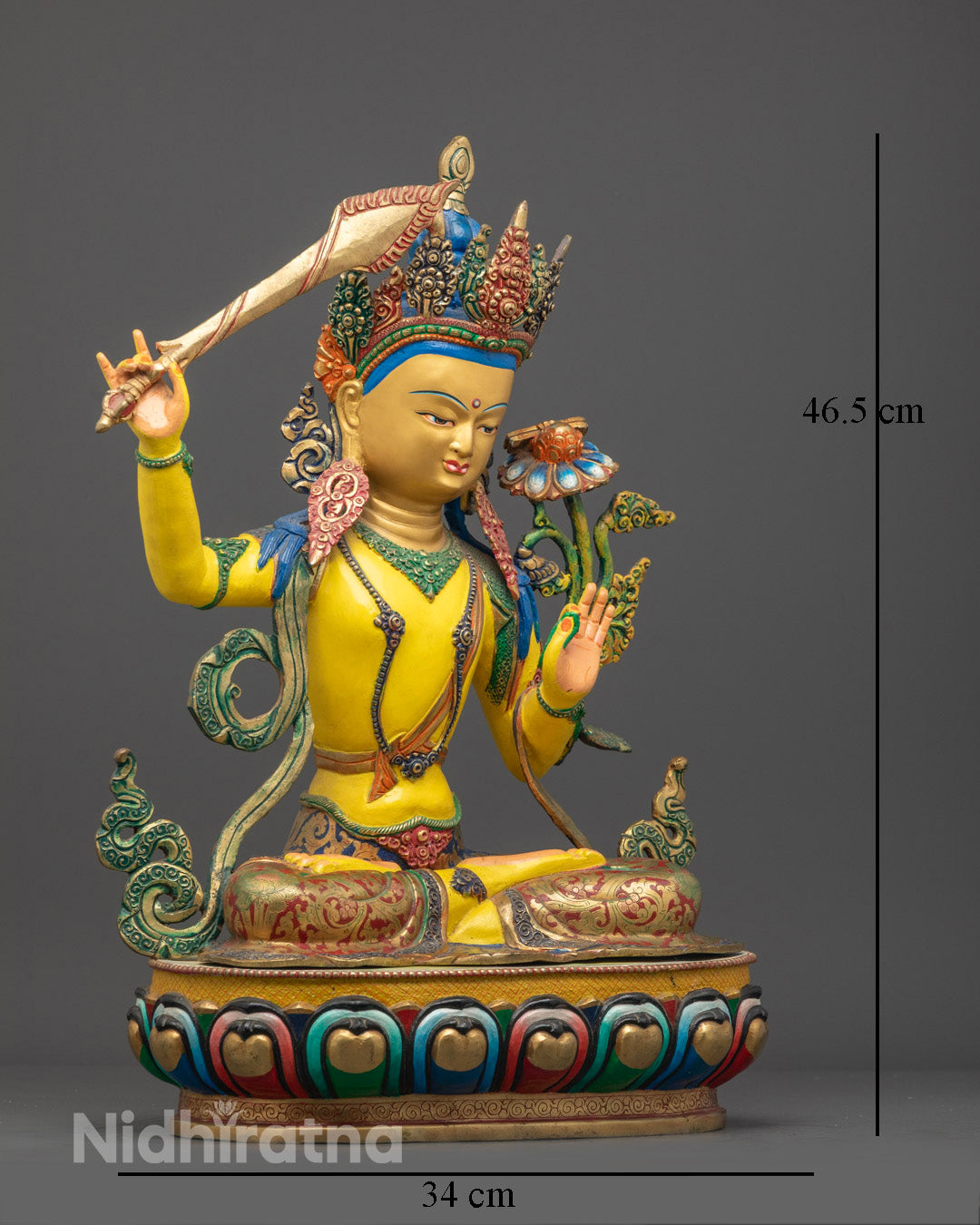 Manjushri statue performing Vitarka Mudra (teaching gesture) with Prajnaparamita Sutra on lotus, showcasing Nepalese craftsmanship.