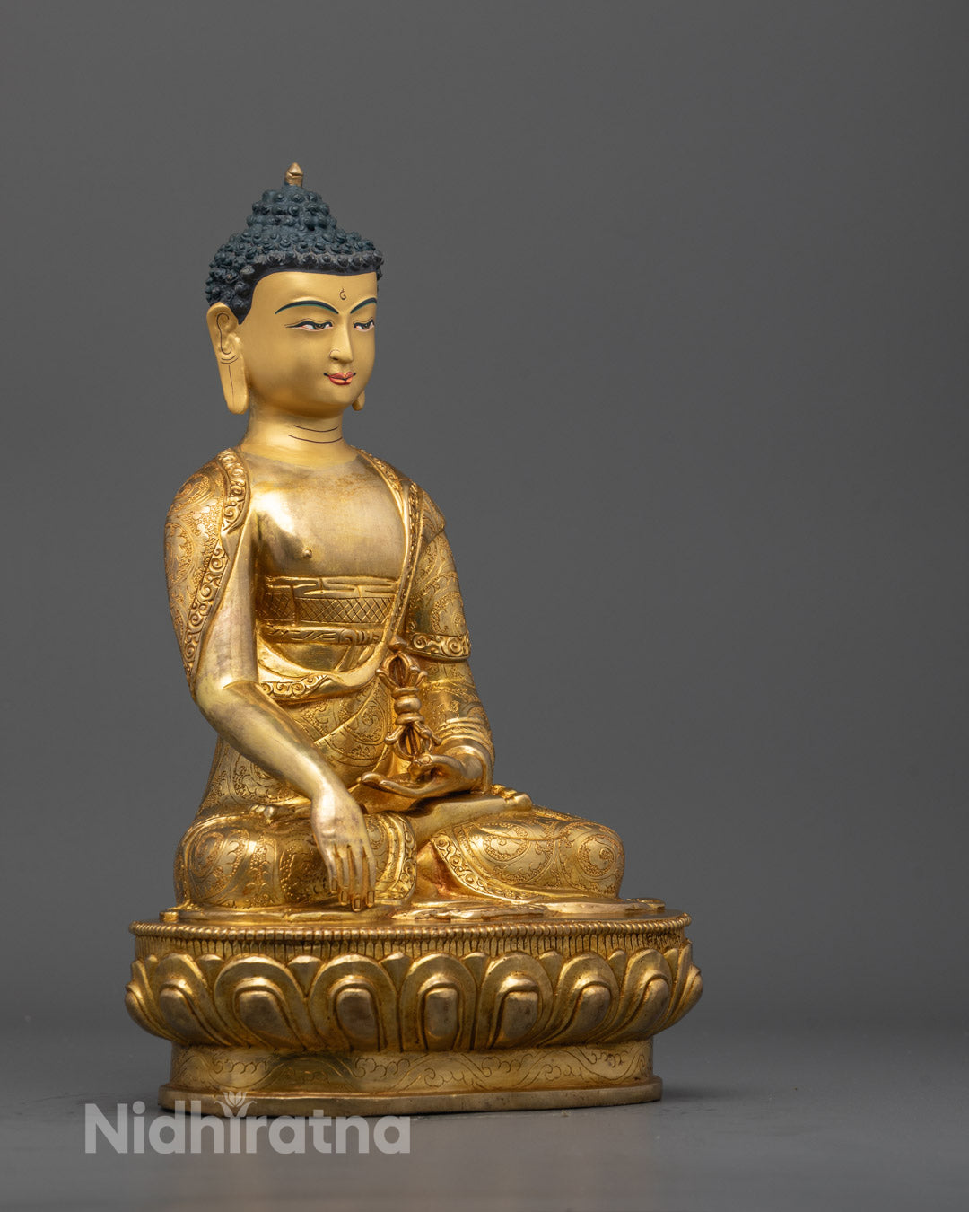 Side view of Mitrugpa Statue showing intricate robe patterns