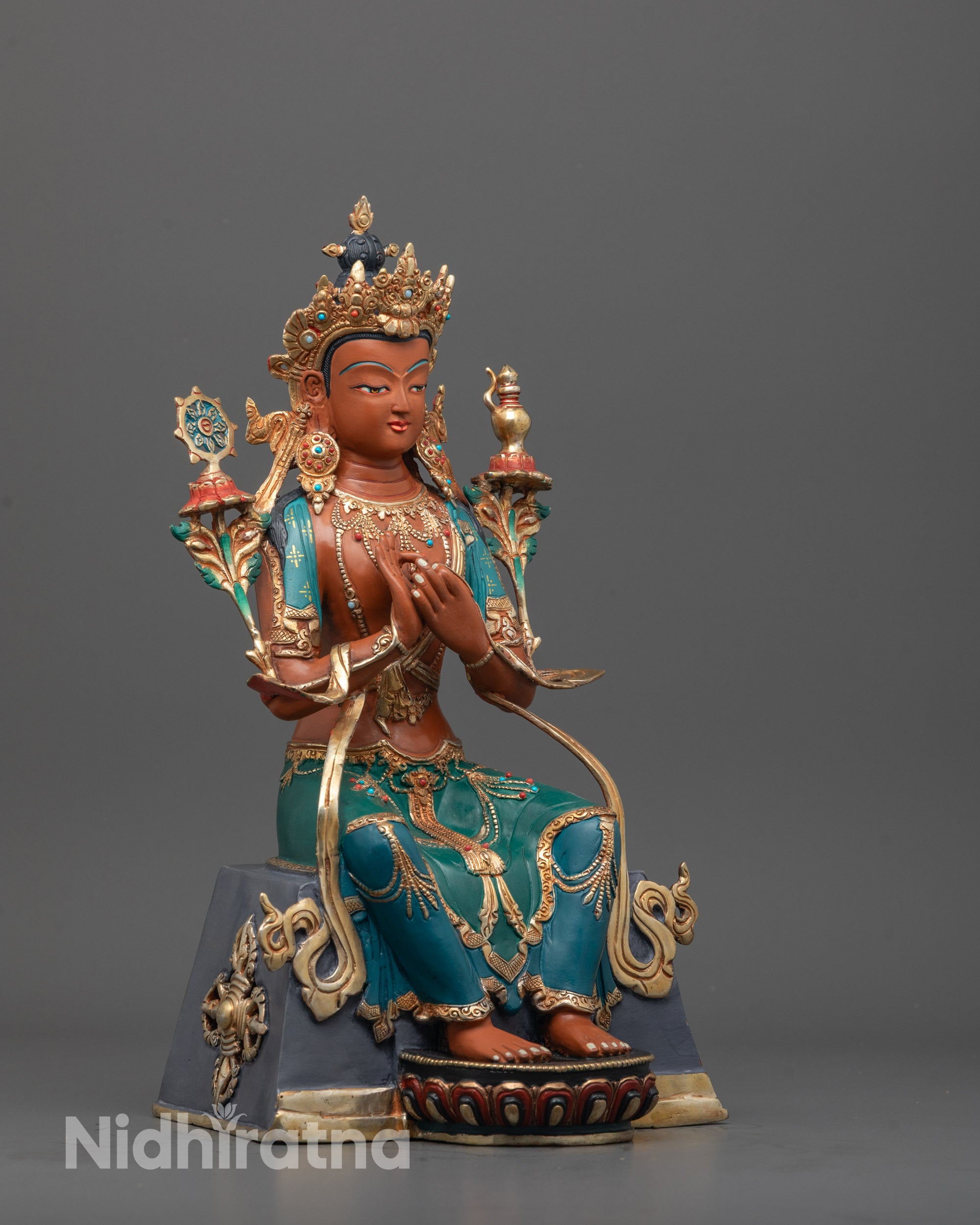 Side view of Red Maitreya Buddha seated in a peaceful posture, symbolizing hope