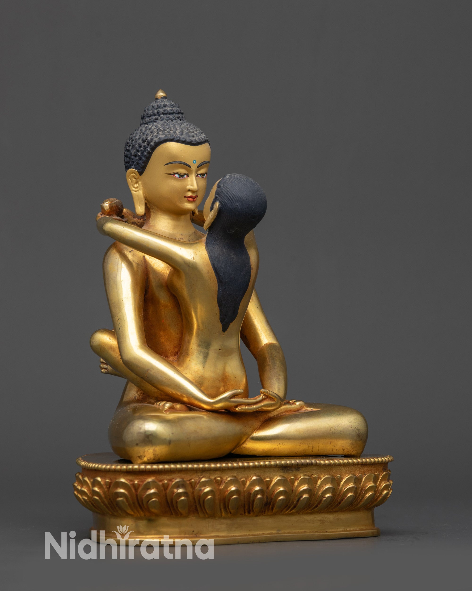Side view of Samantabhadra Yab Yum Tibetan deity sculpture on gold lotus base