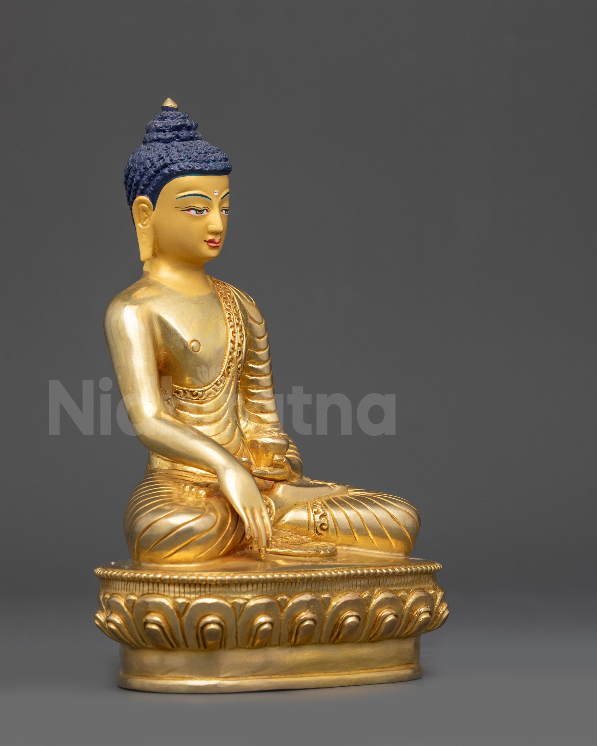 Side view of Shakyamuni Buddha holding monkβs bowl in meditation posture